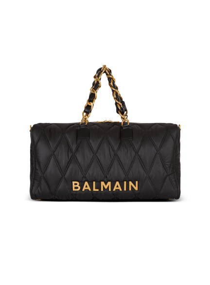 Quilted nylon travel bag with diamond motif