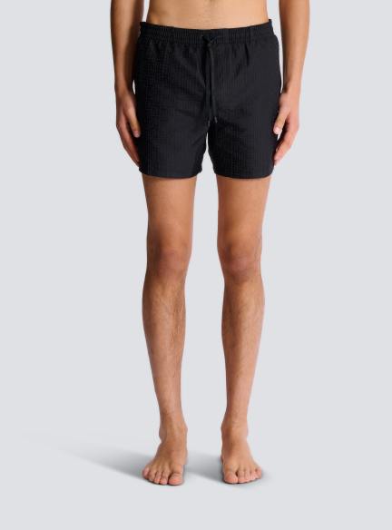 Monogrammed swim shorts