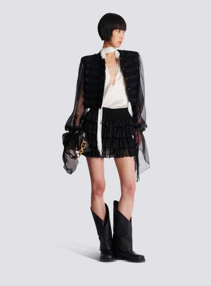 Backless fringed satin top