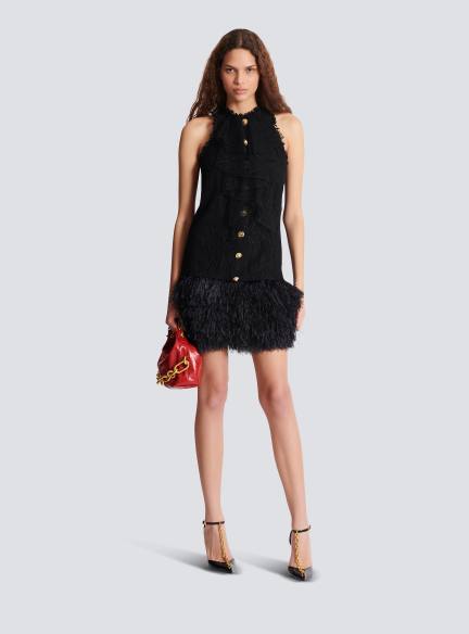 Flowing lace and feather dress