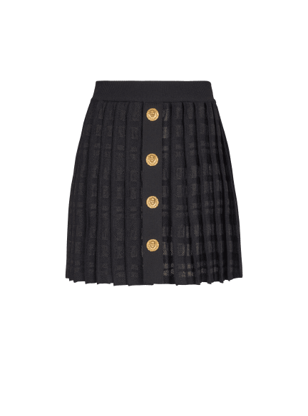 Short pleated skirt in plaid knit