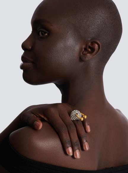 Piercing brass and rhinestone ring