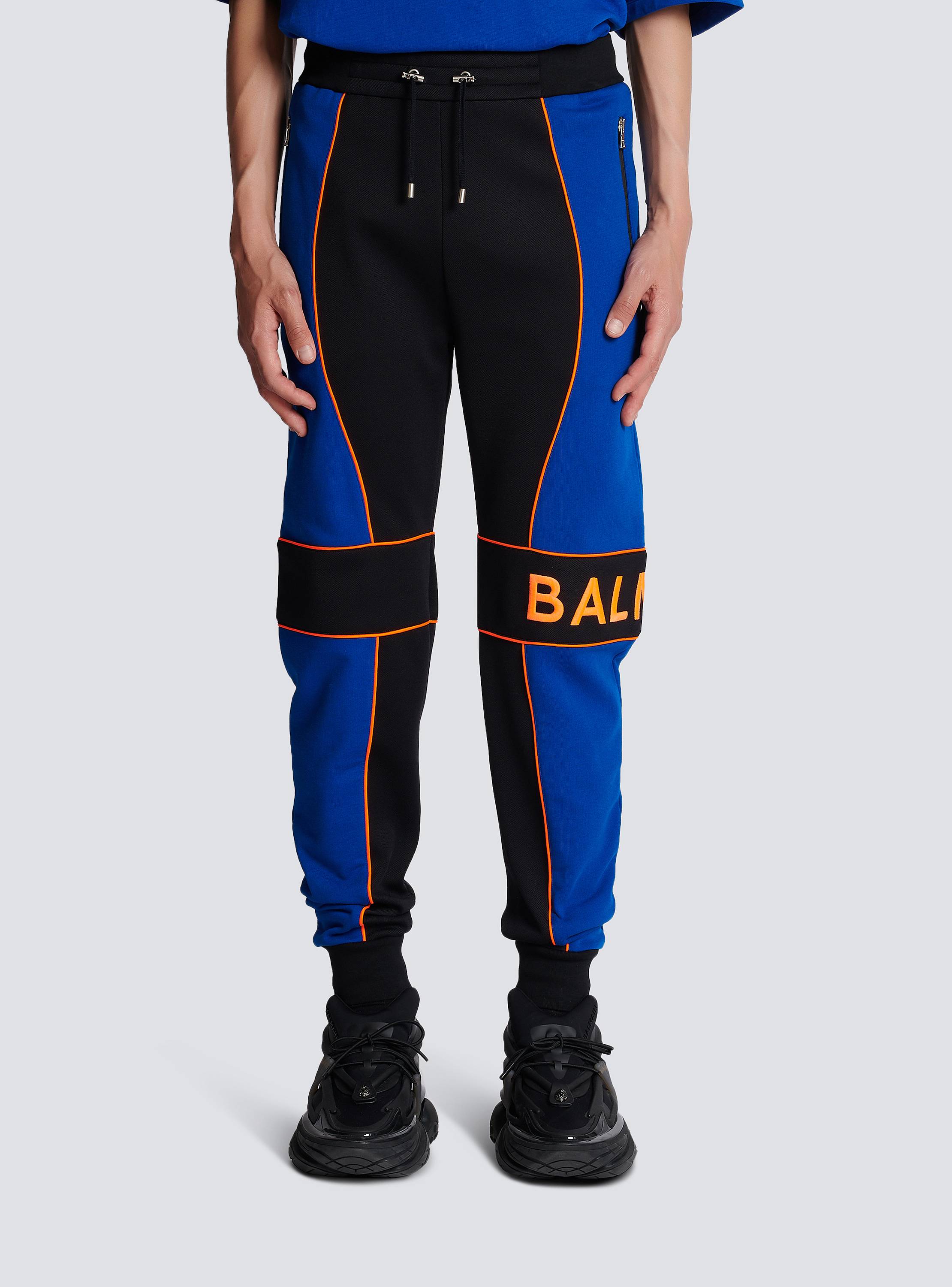 Jogging bottoms with Balmain logo inserts - Men | BALMAIN
