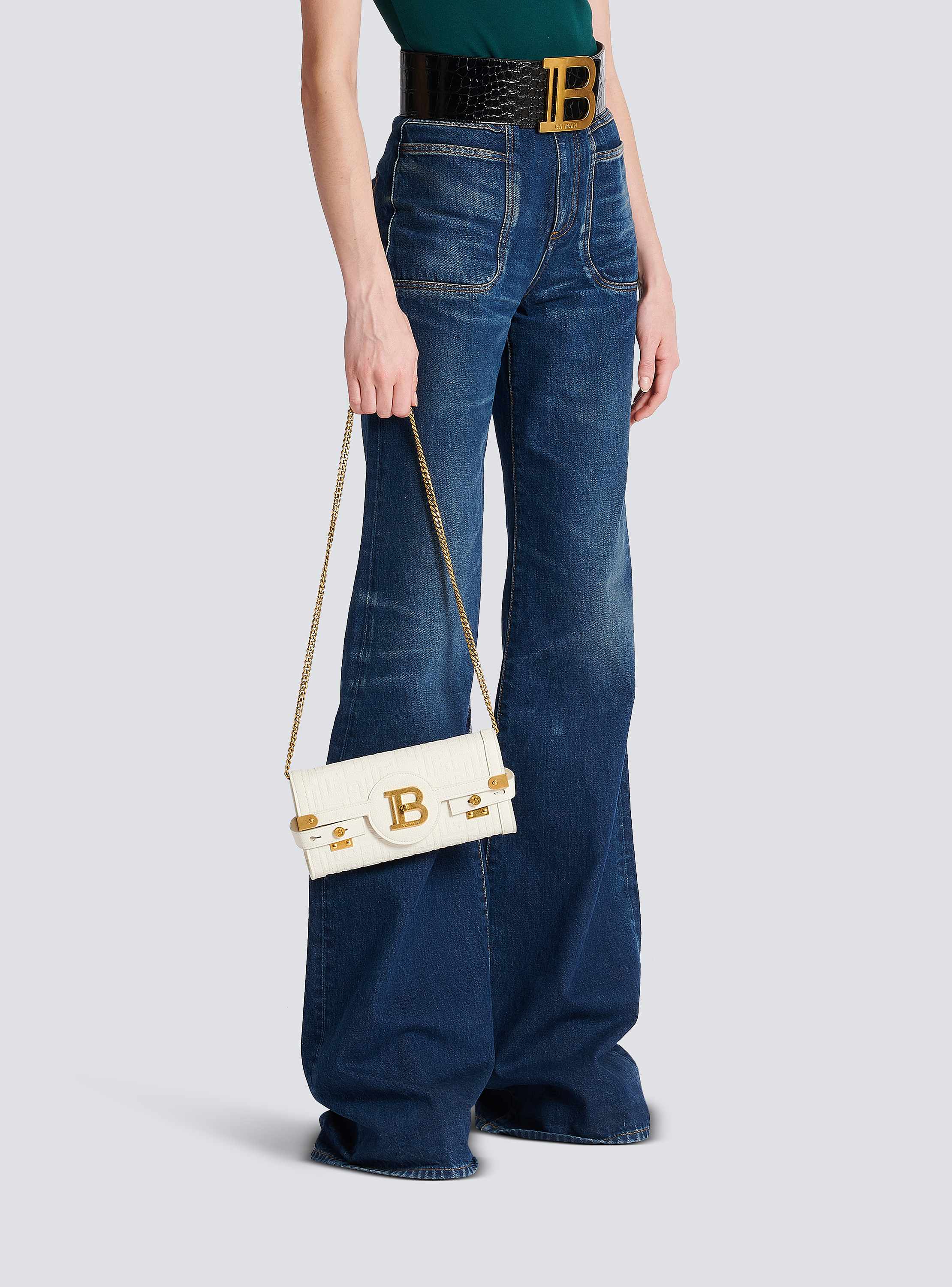 B-Buzz 23 monogrammed grained leather clutch beige - Women
