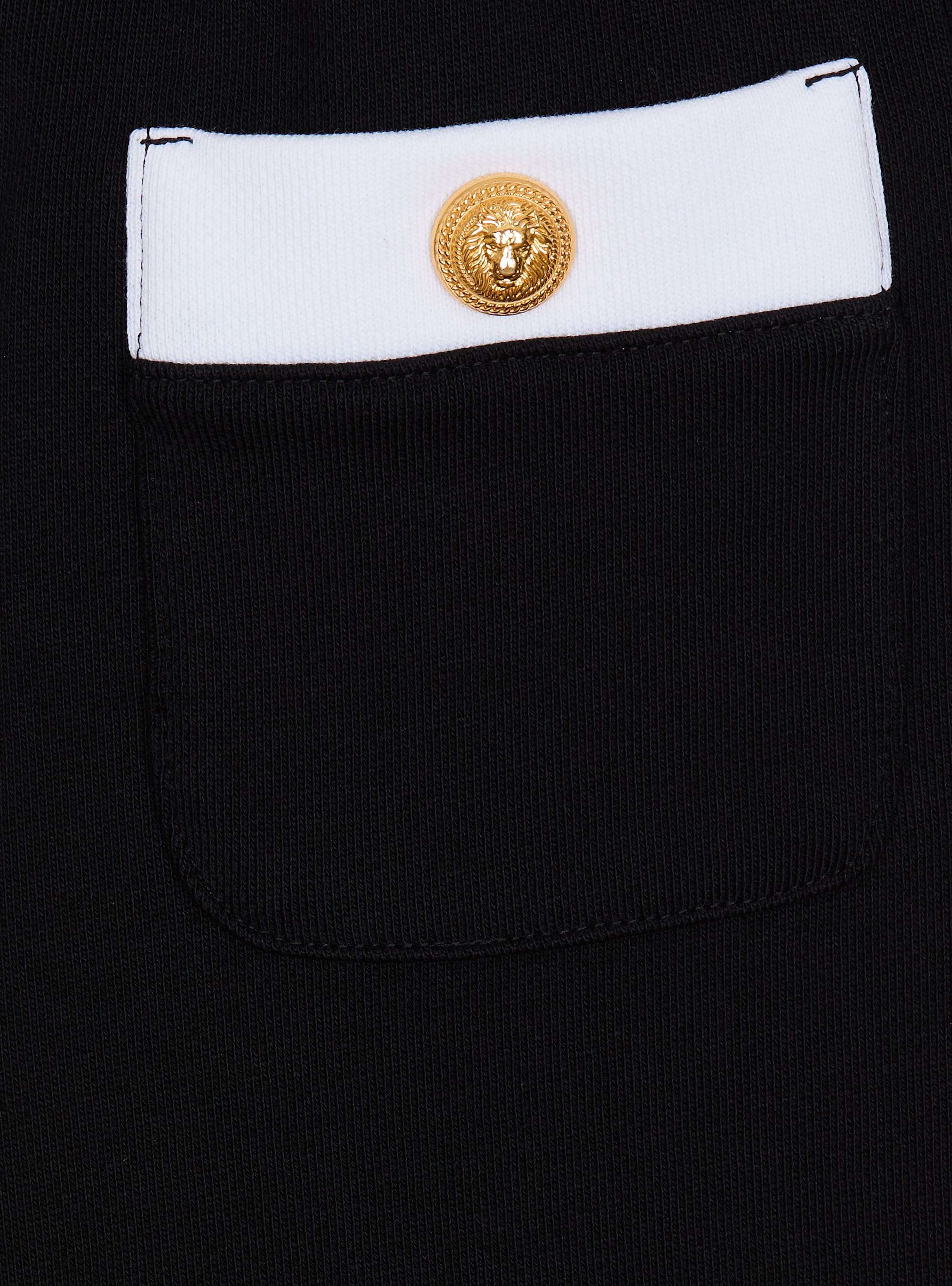 Two-tone trousers with buttons