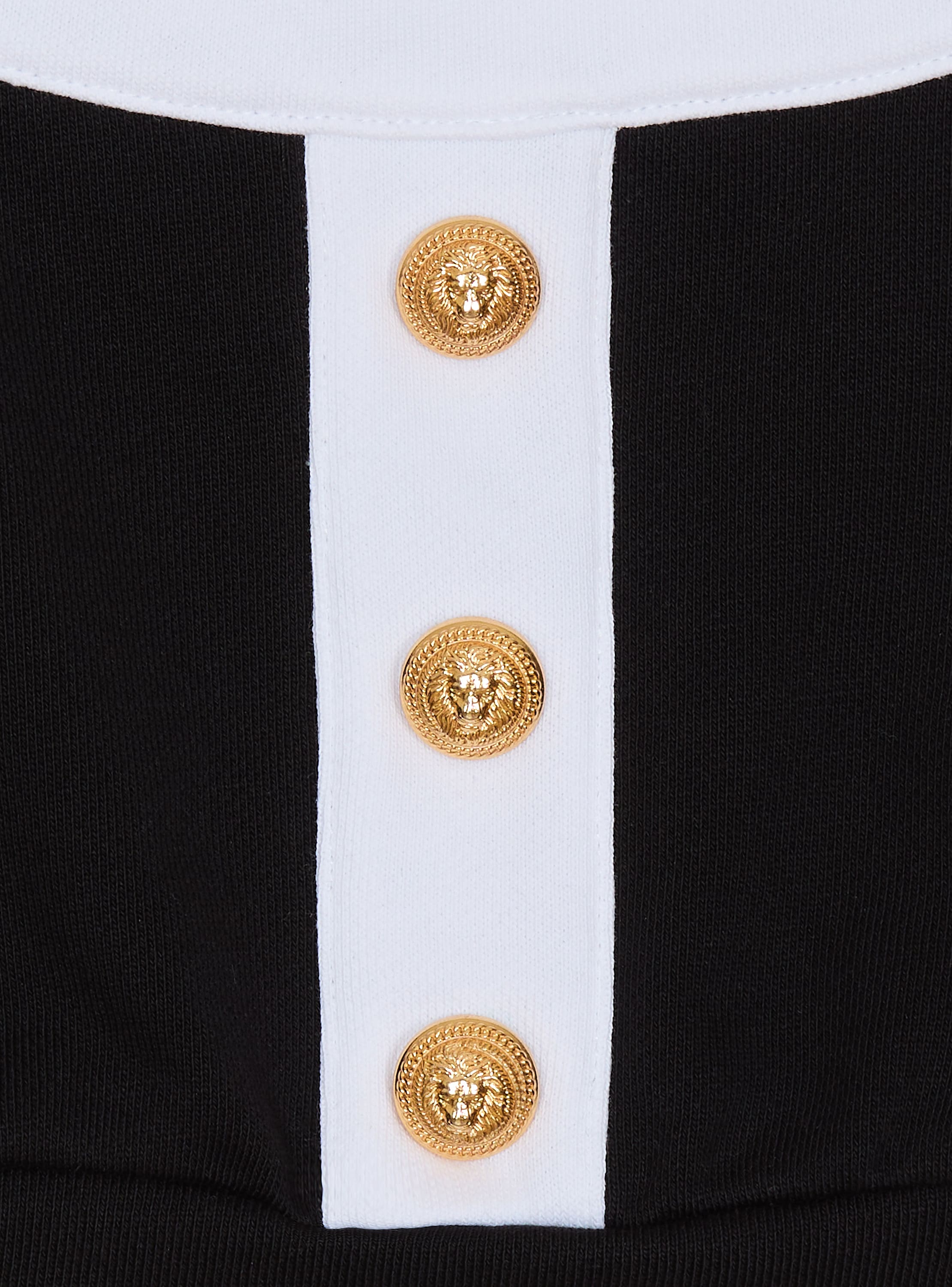 Two-tone top with buttons