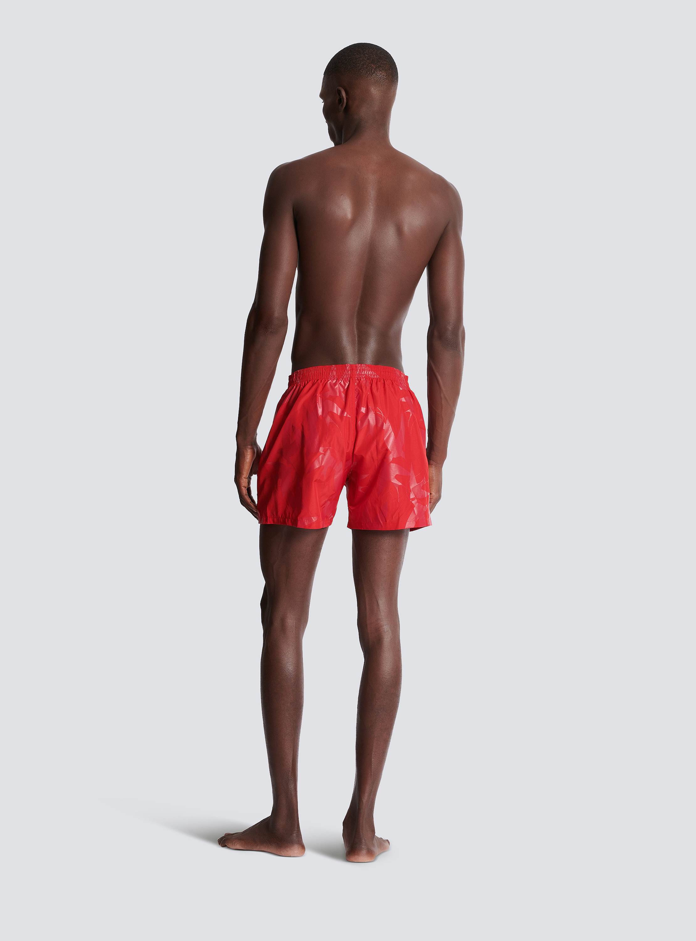 Swallow printed swim shorts red - Men | BALMAIN