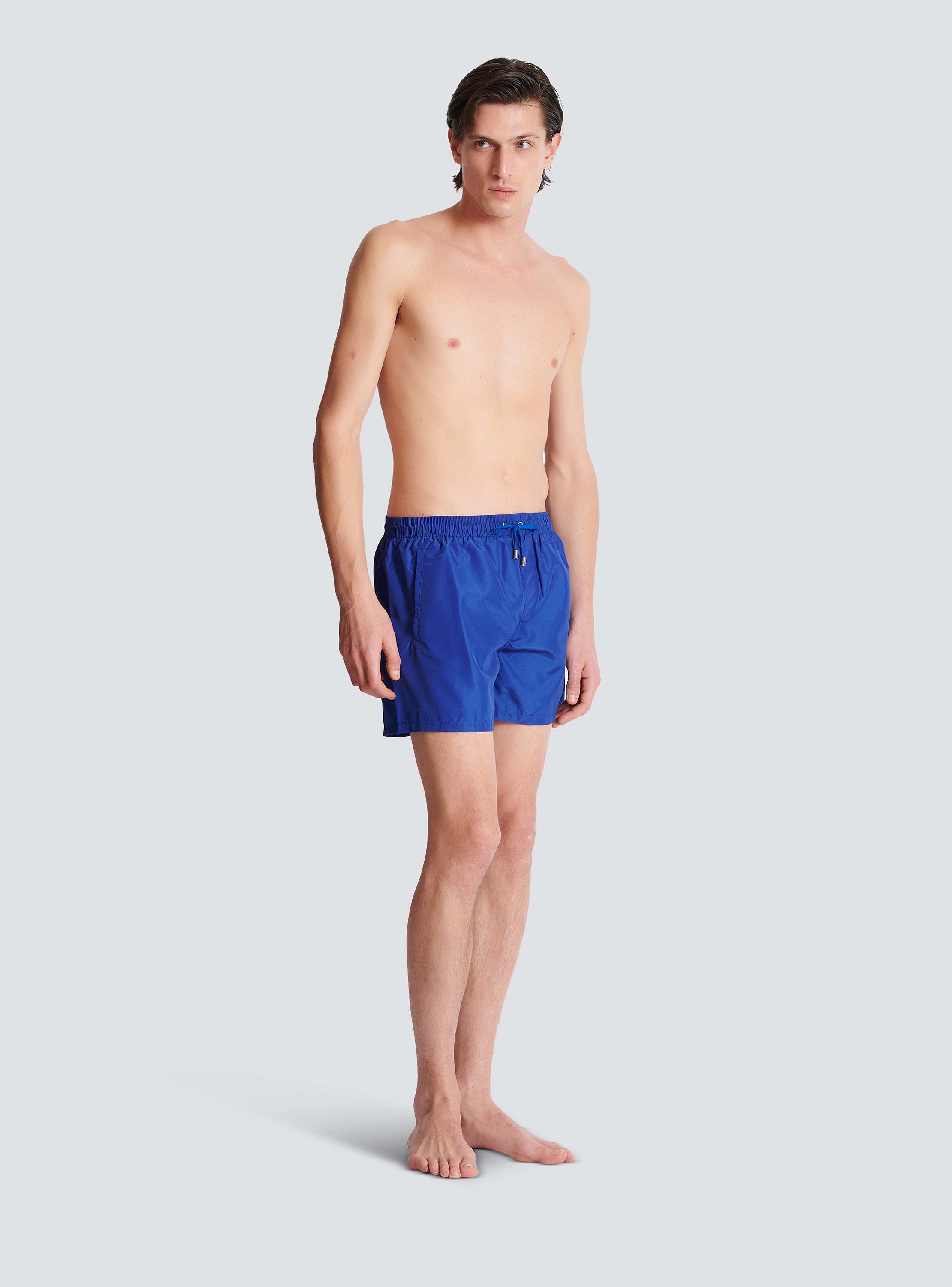 Printed Balmain Paris swim shorts - Men | BALMAIN