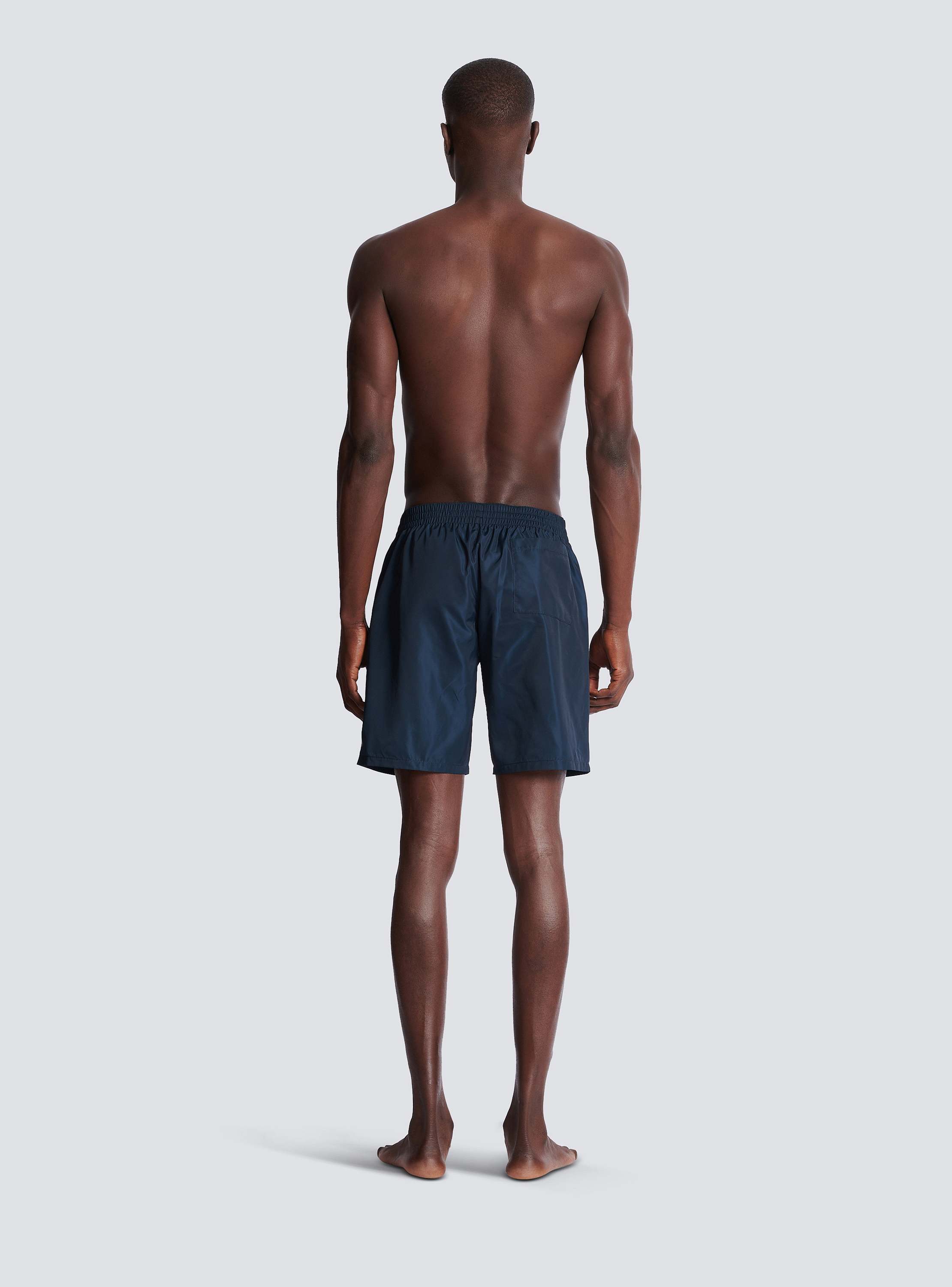 Swim shorts with Balmain College logo