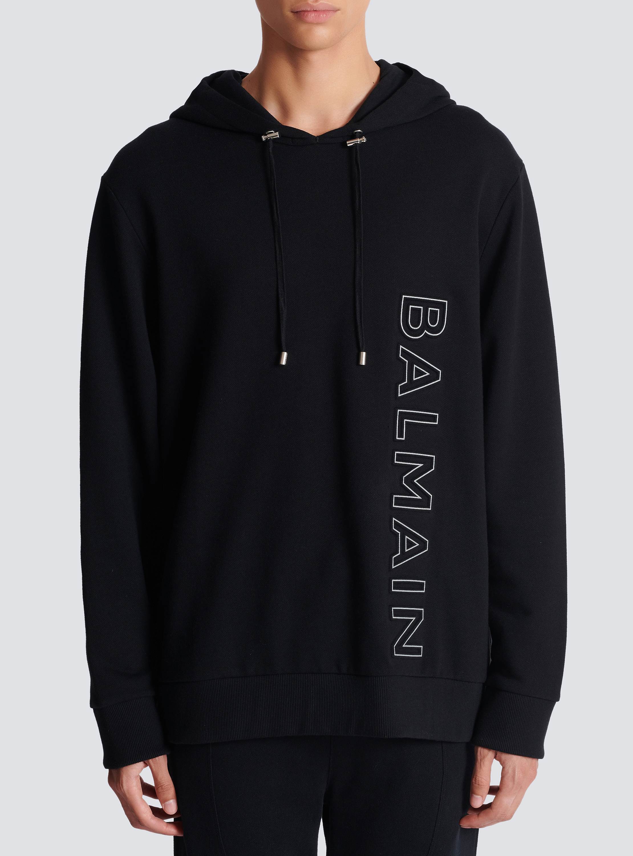 BALMAIN ロコ エンホス トロストリンク フティ H1JT046BC22 SHX Embossed Balmain hooded sweatshirt - Men | BALMAIN