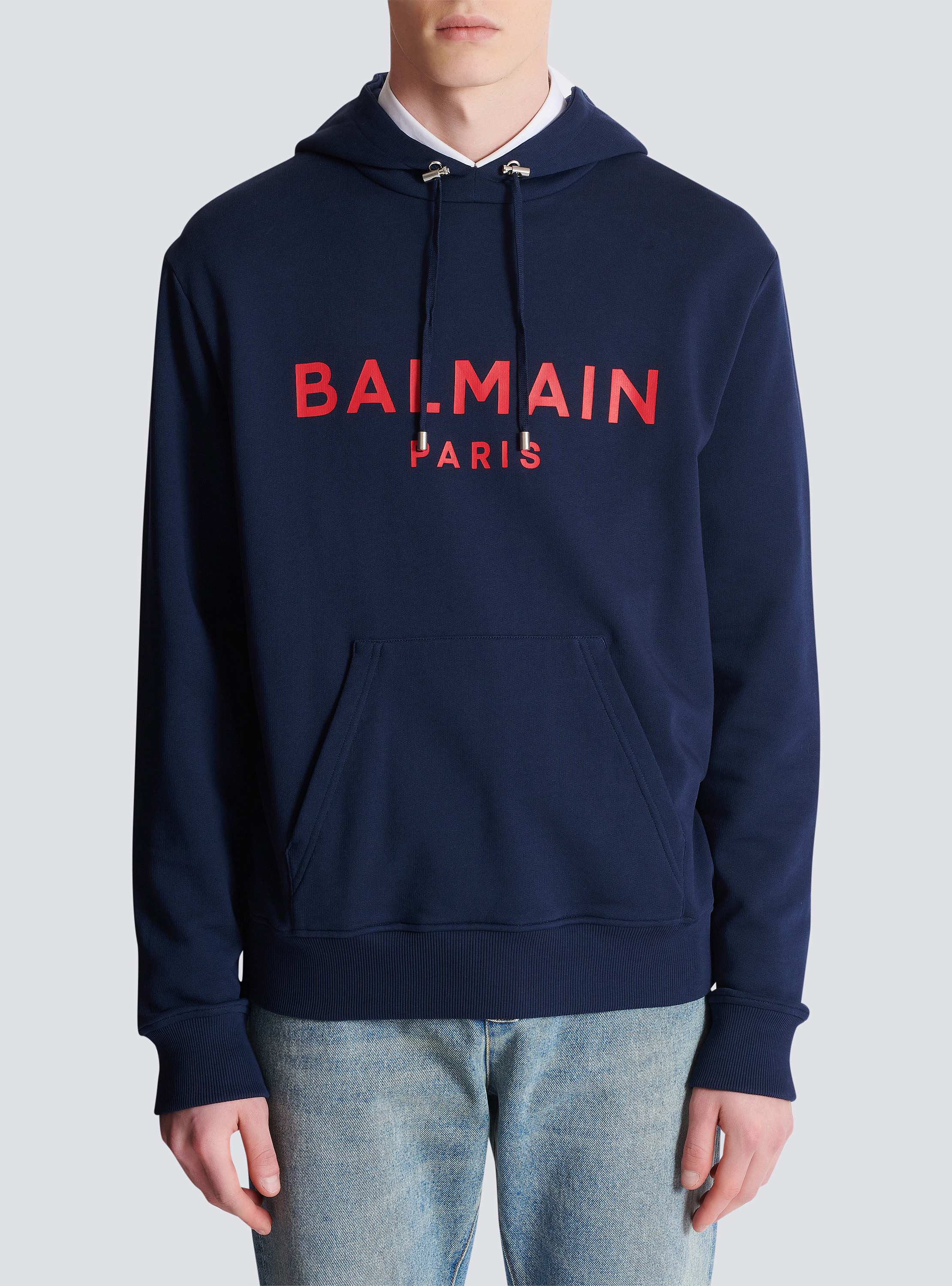 24AW◆BALMAIN◆Balmain Paris プリント フーディー ブルー Printed Balmain Paris hoodie - Men | BALMAIN