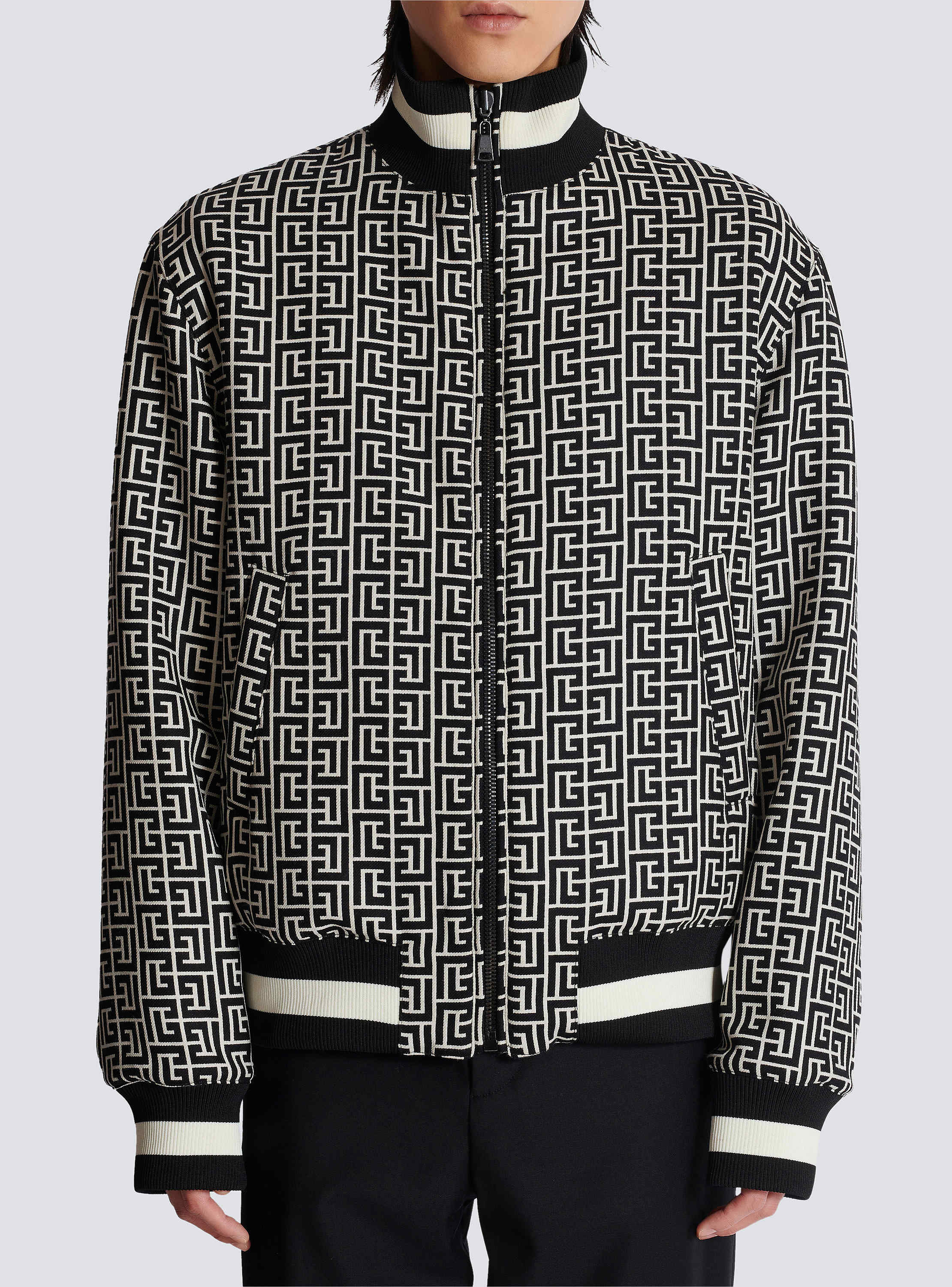 Reversible monogrammed bomber jacket