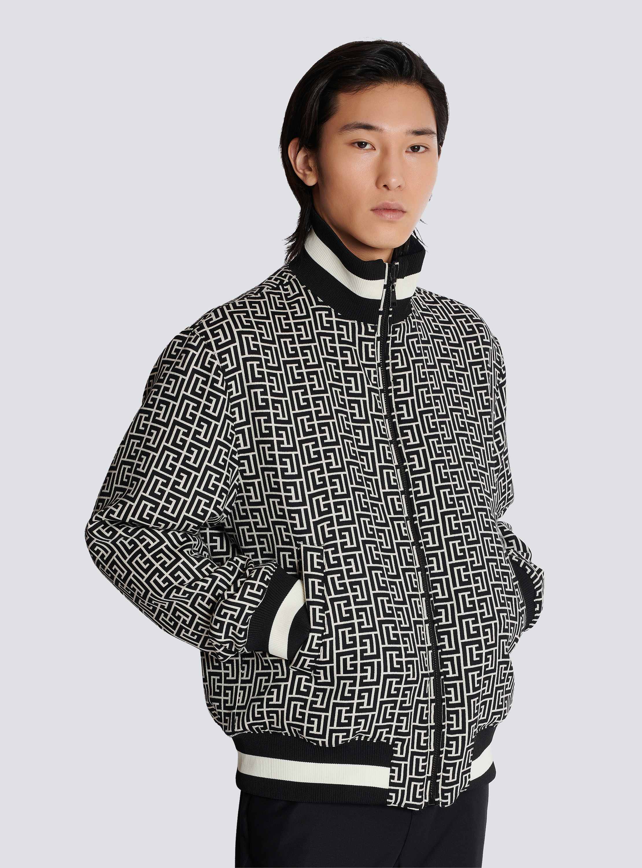 Reversible monogrammed bomber jacket