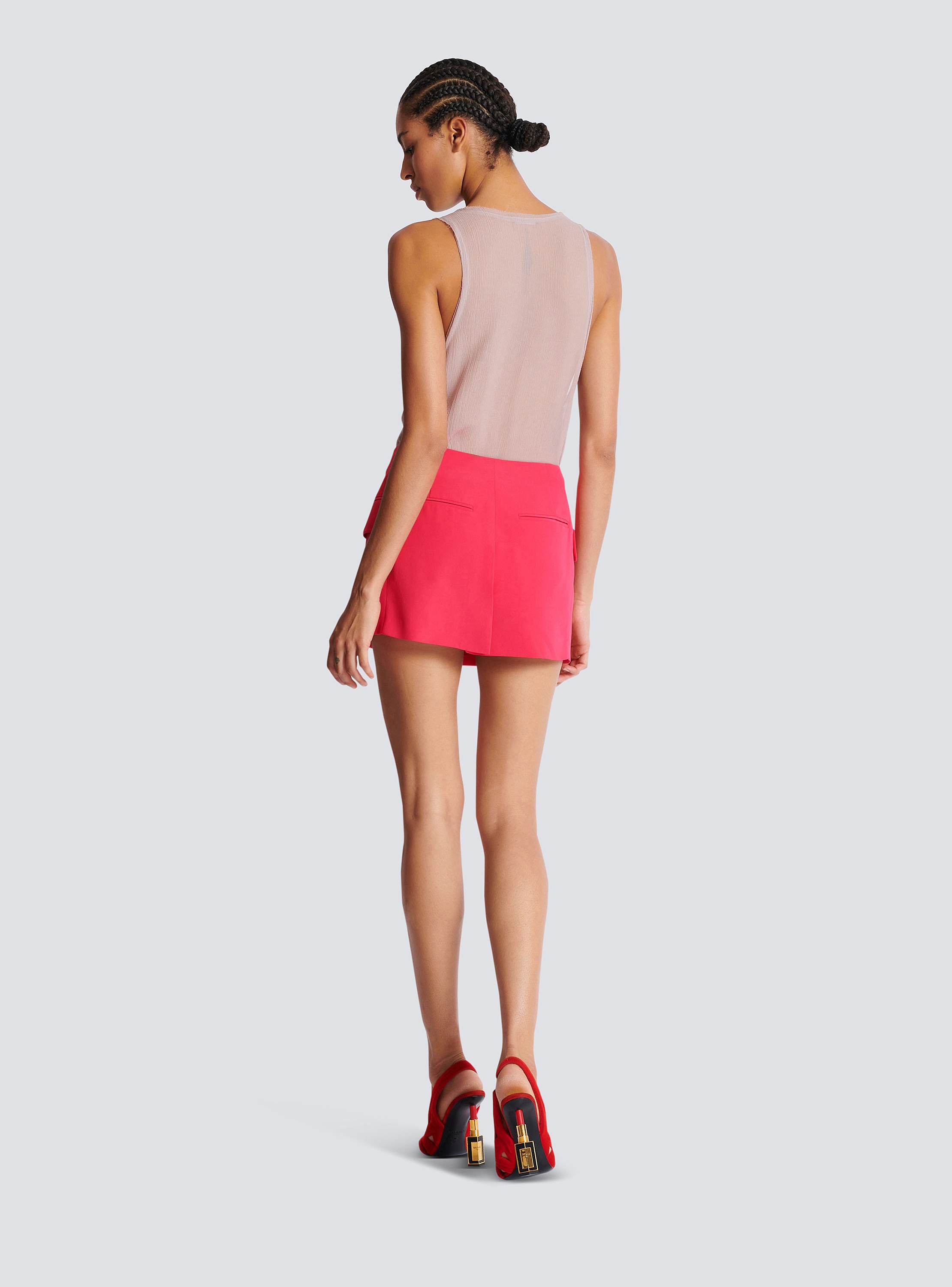 Asymmetric crepe mini skirt