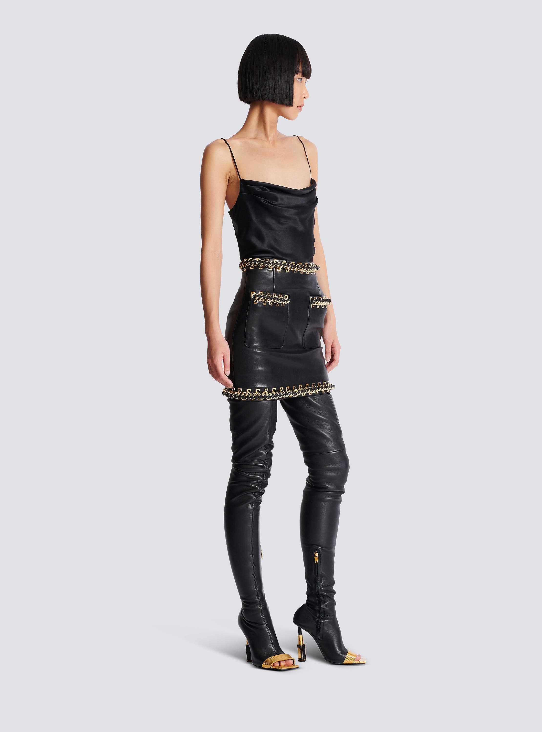 Short lambskin skirt with chains black - Women | BALMAIN