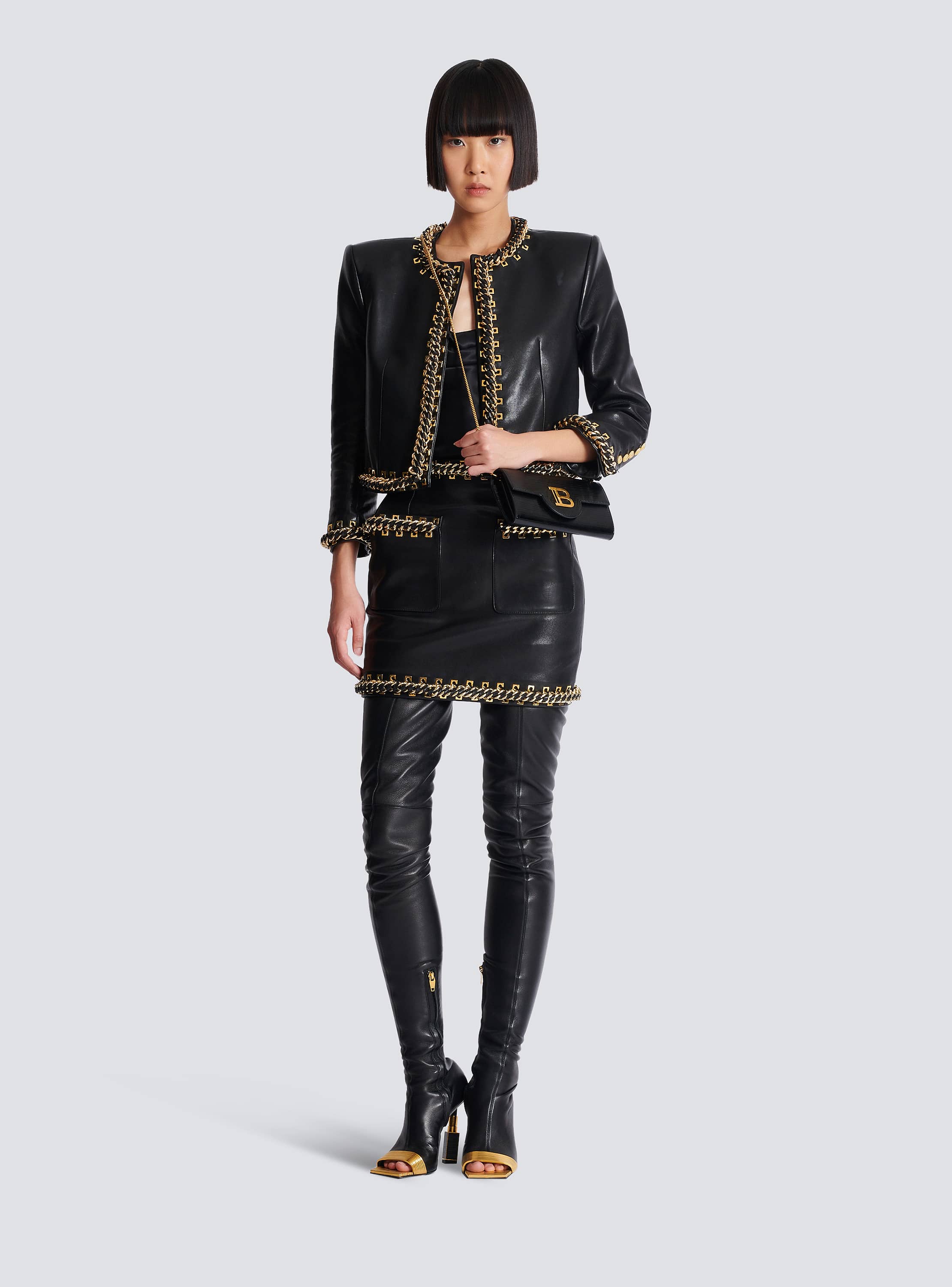 Short lambskin skirt with chains black - Women | BALMAIN