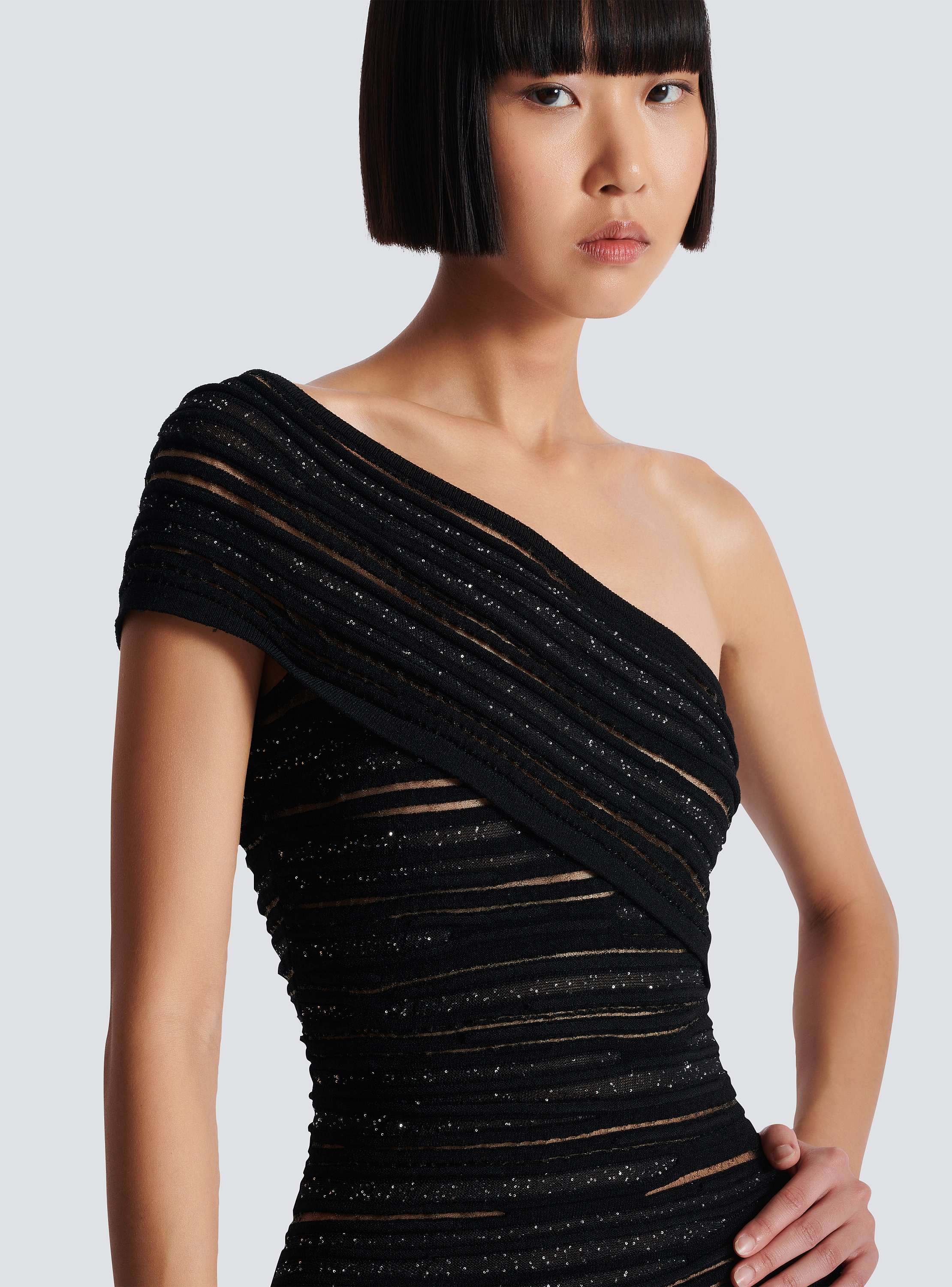 Asymmetrical dress in shiny rolled knit black - Women | BALMAIN