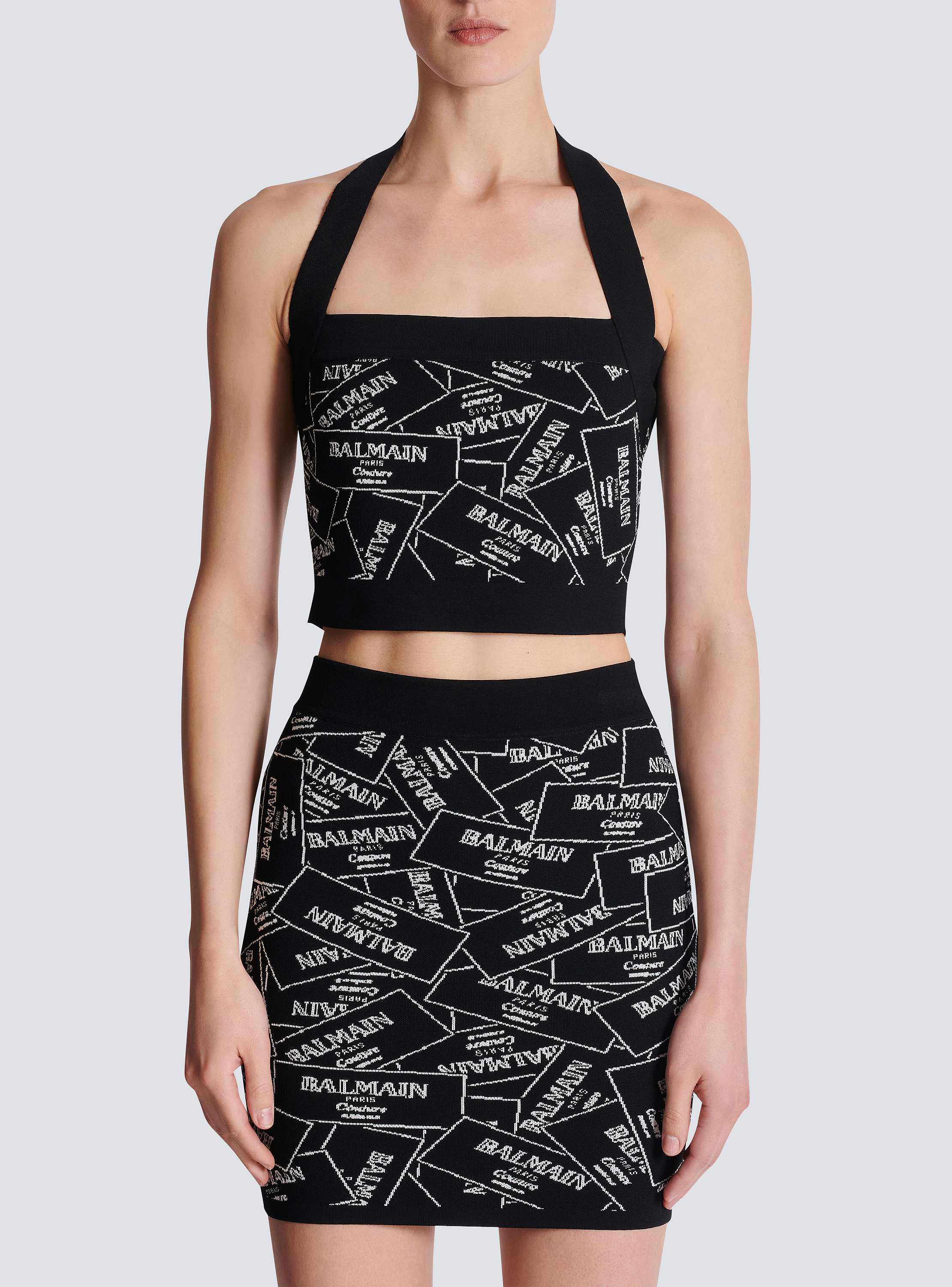 Knit halterneck top with Balmain label motif - Women | BALMAIN