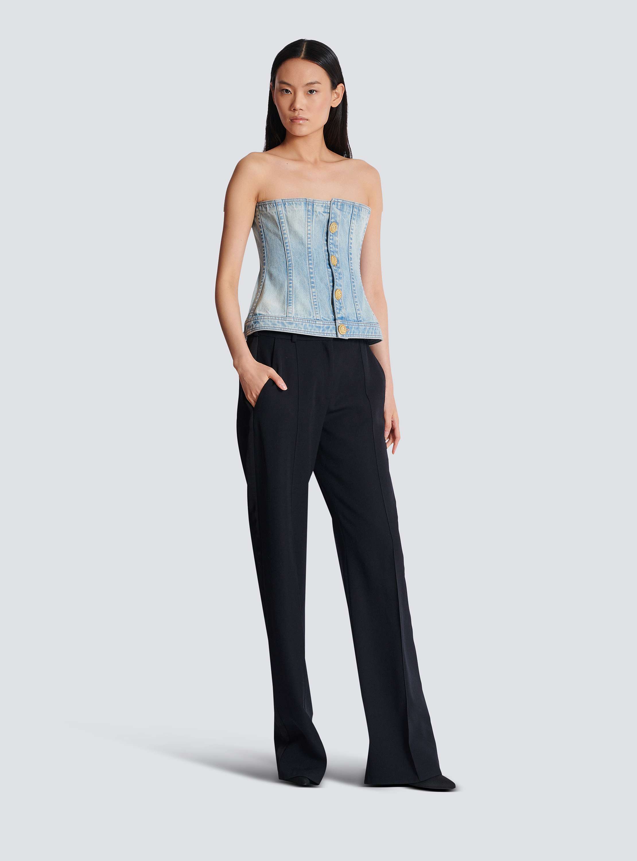 Buttoned light blue denim corset top