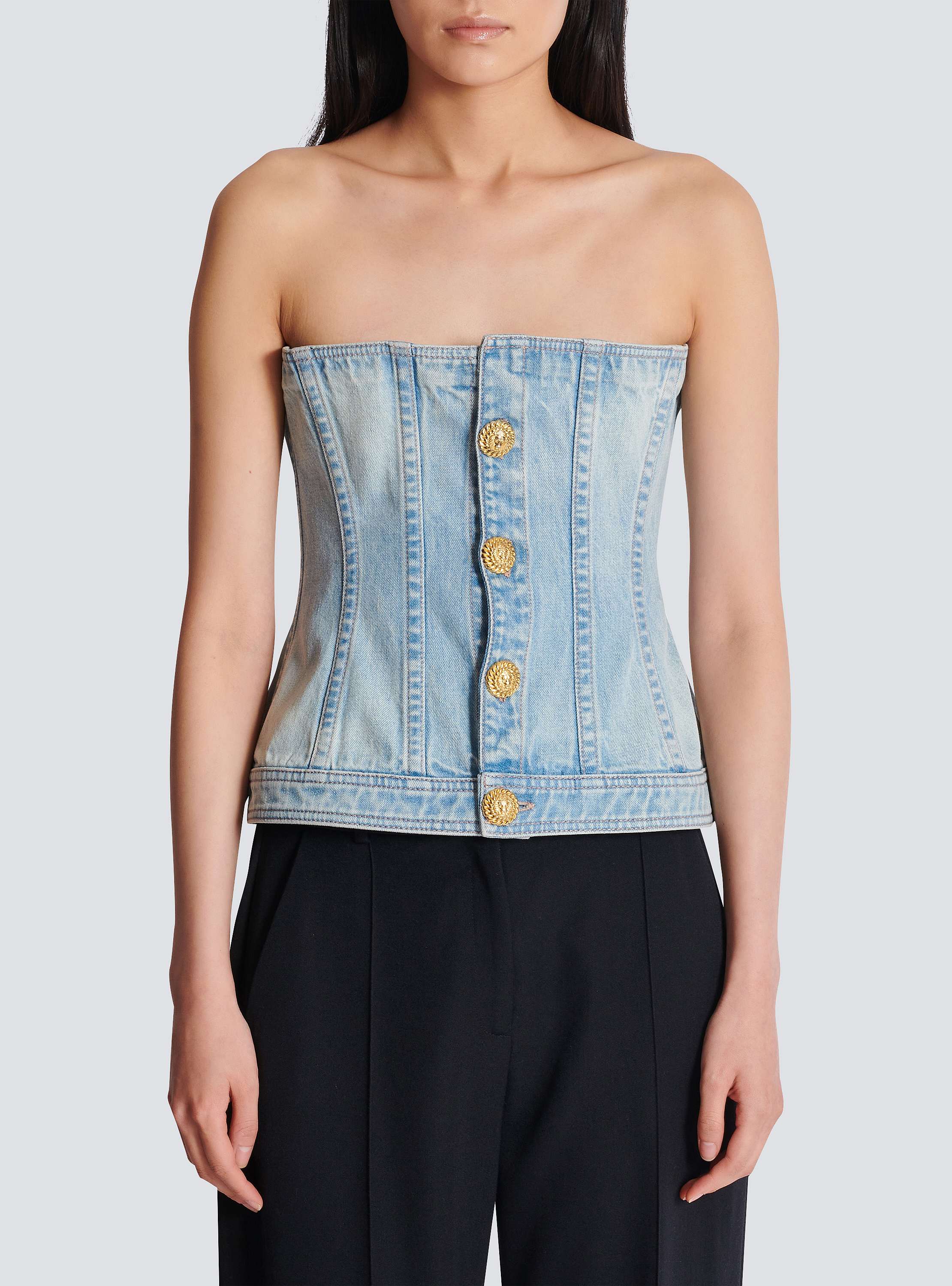 Buttoned light blue denim corset top