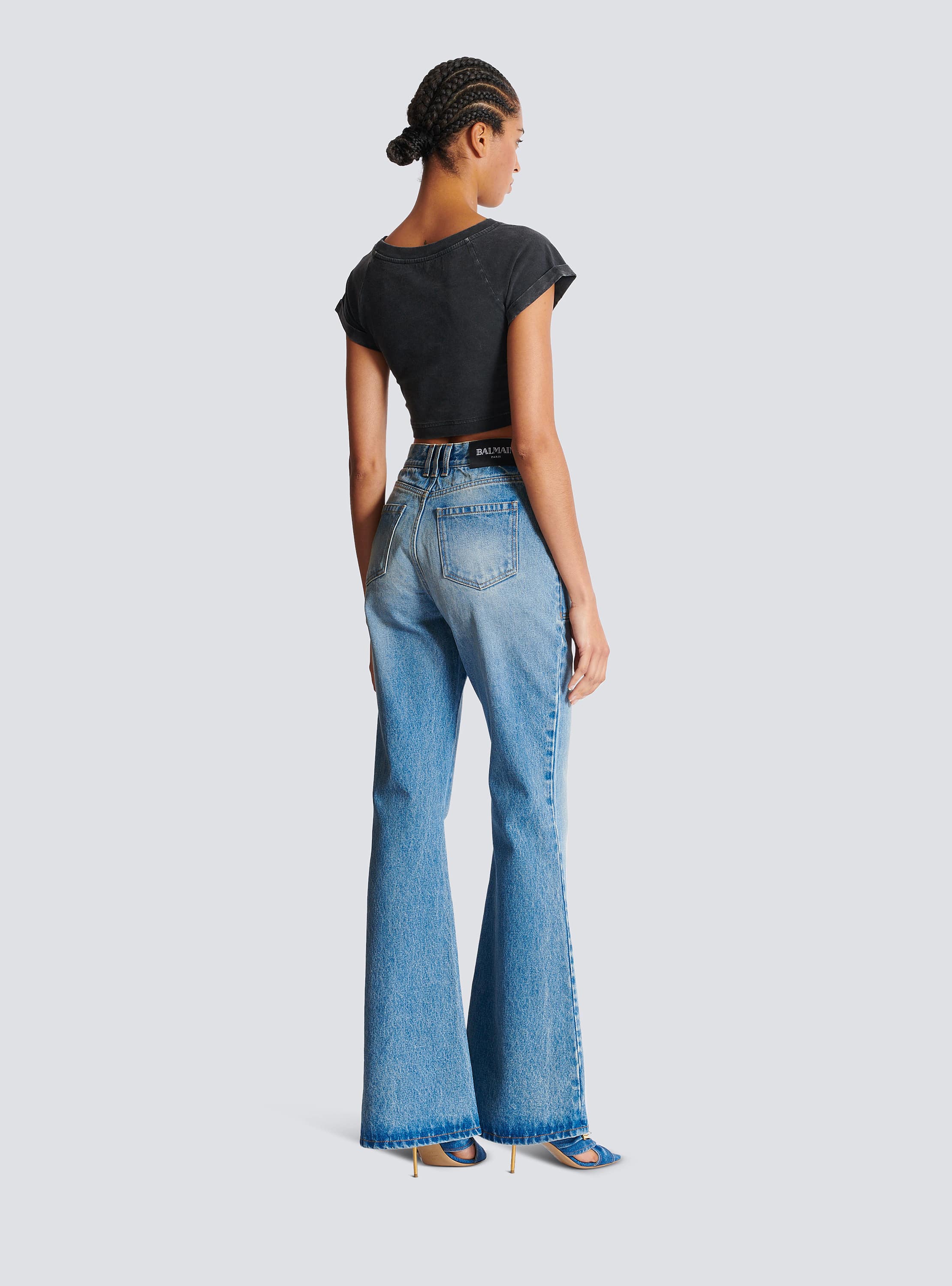 High-waisted flared denim jeans - Women | BALMAIN