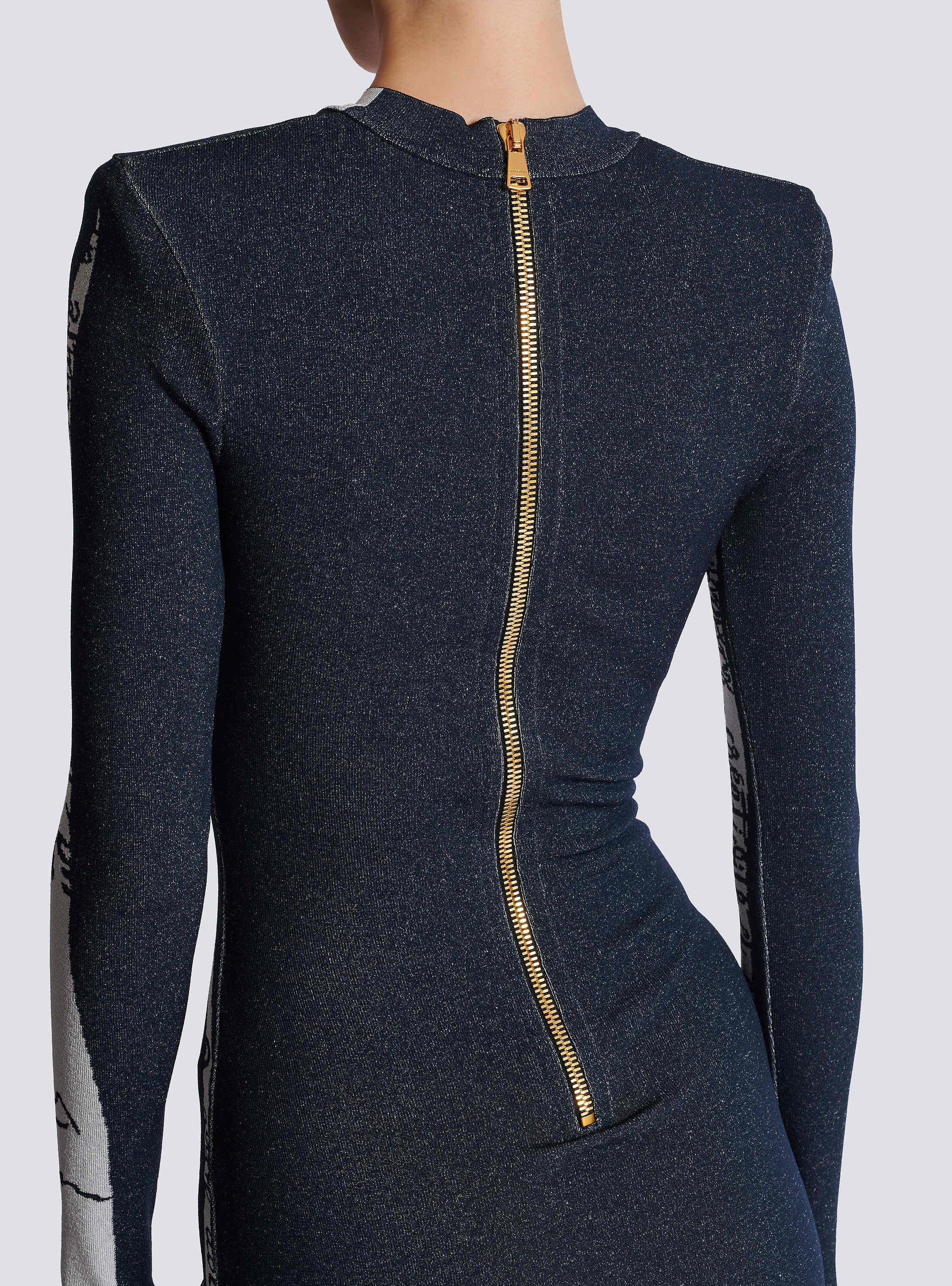 Short embroidered dress with body motif