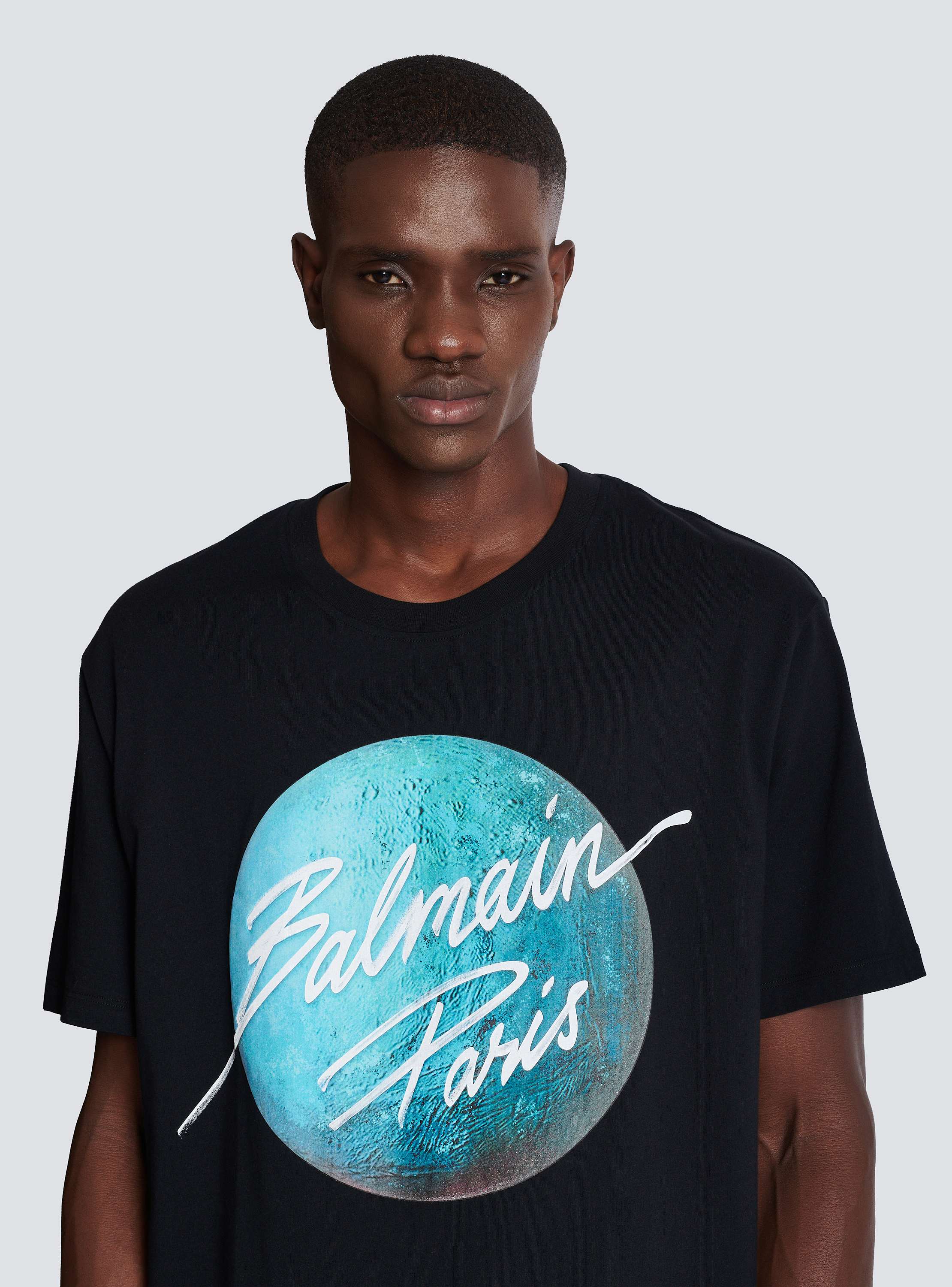 Printed Balmain Paris logo and planet T-shirt - Men | BALMAIN