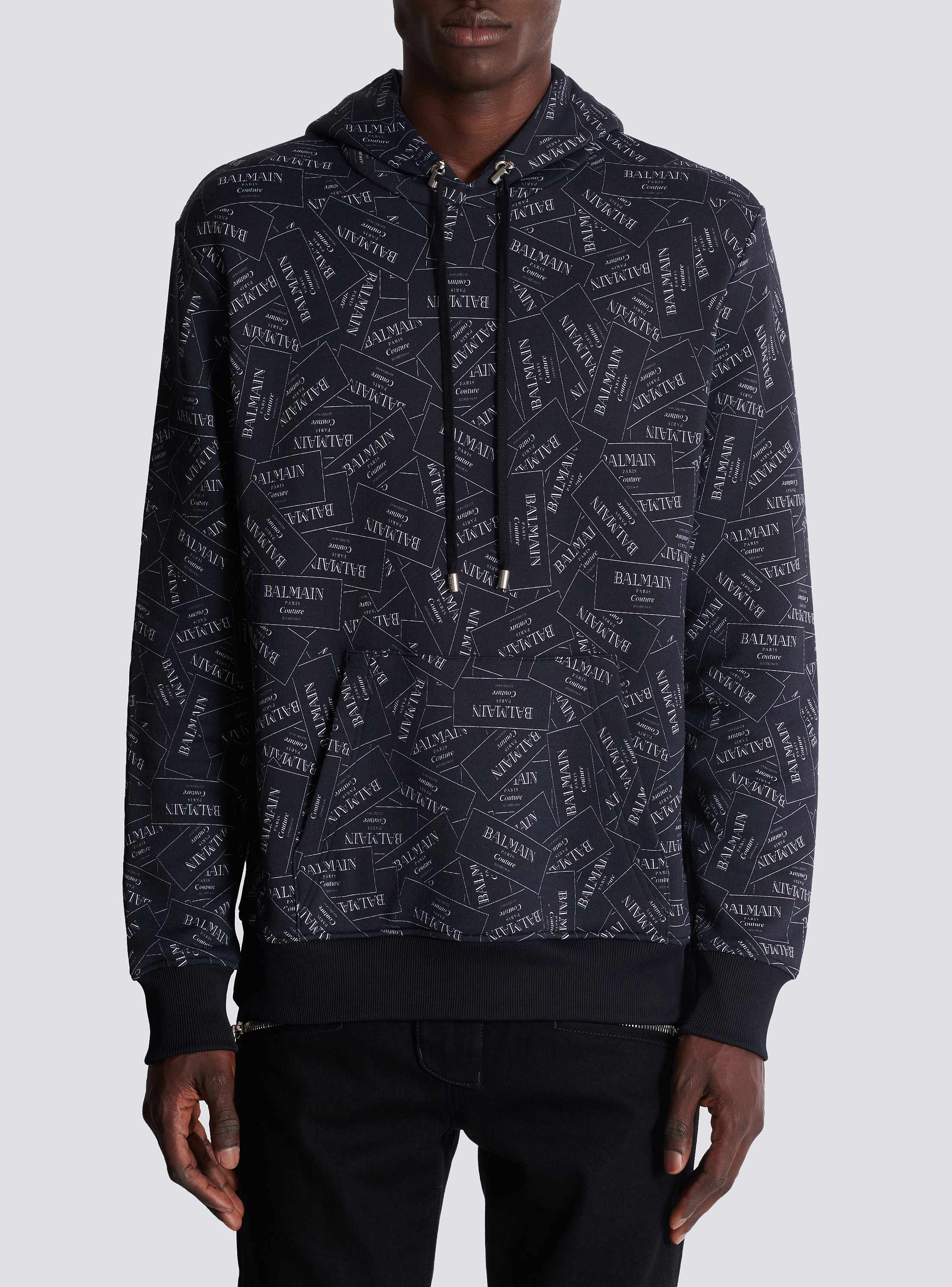 Hoodie with all-over Balmain label print - Men | BALMAIN