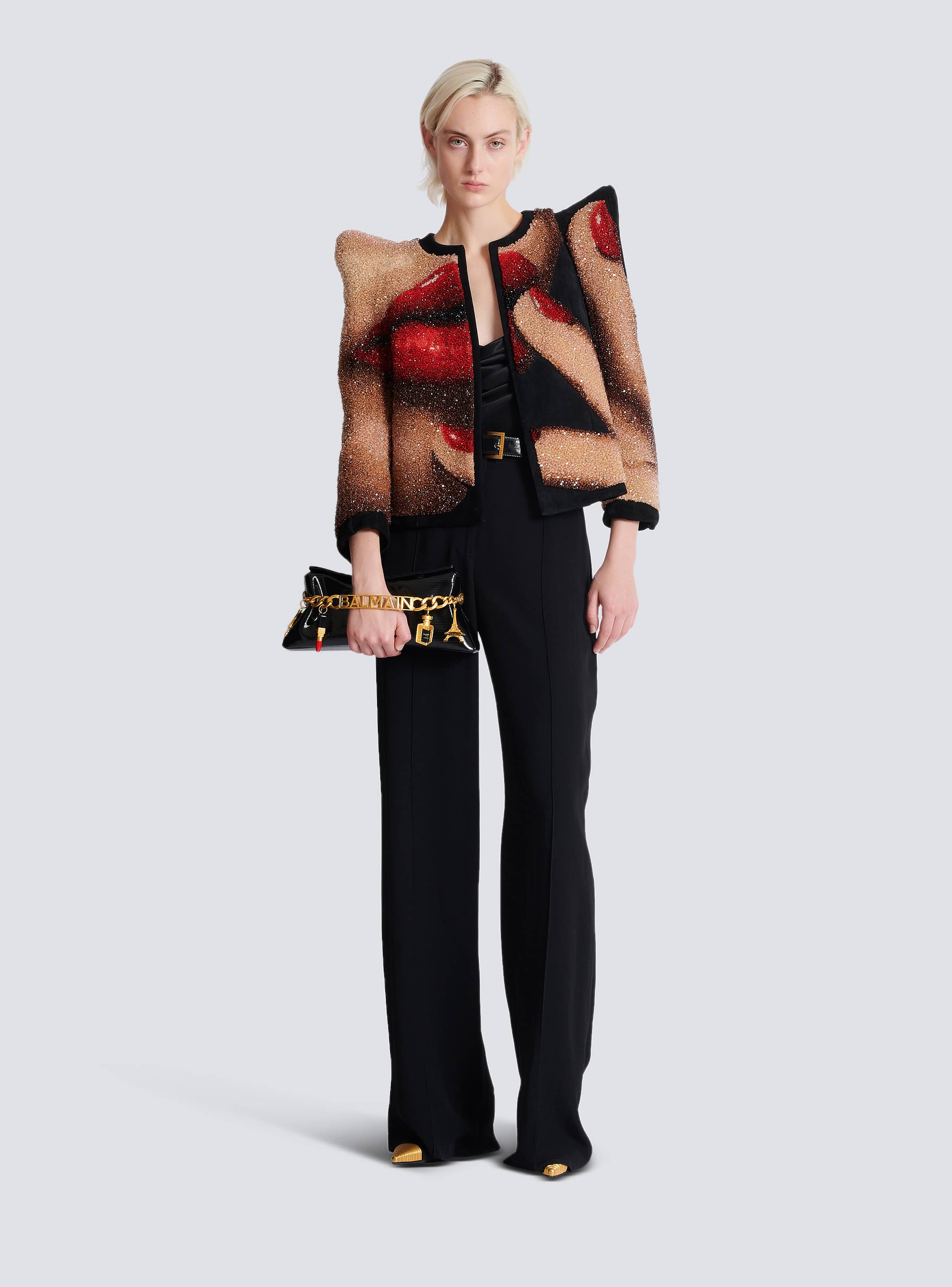 1945 Soft clutch in striped patent leather - Women | BALMAIN