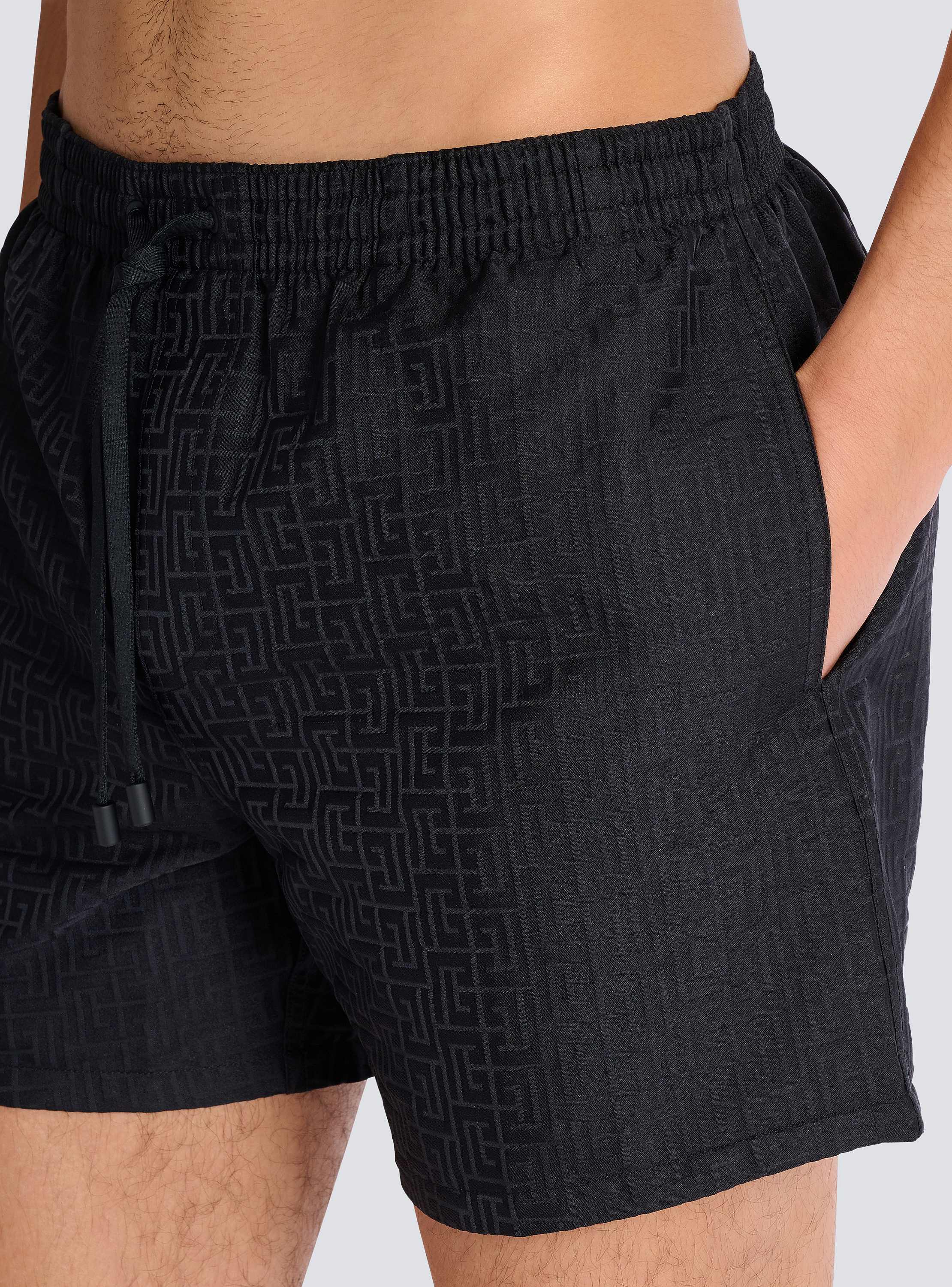 Monogrammed swim shorts