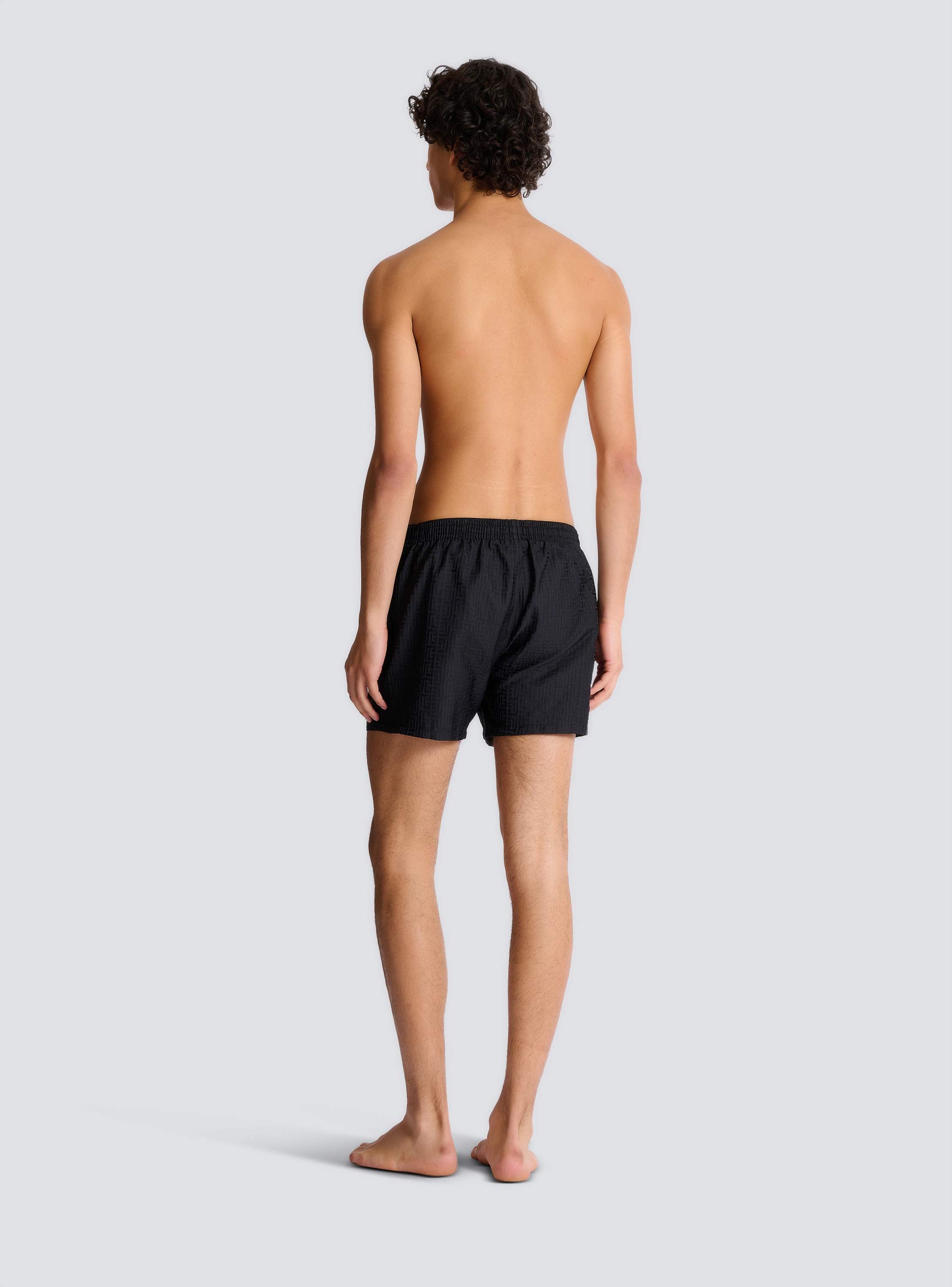 Monogrammed swim shorts