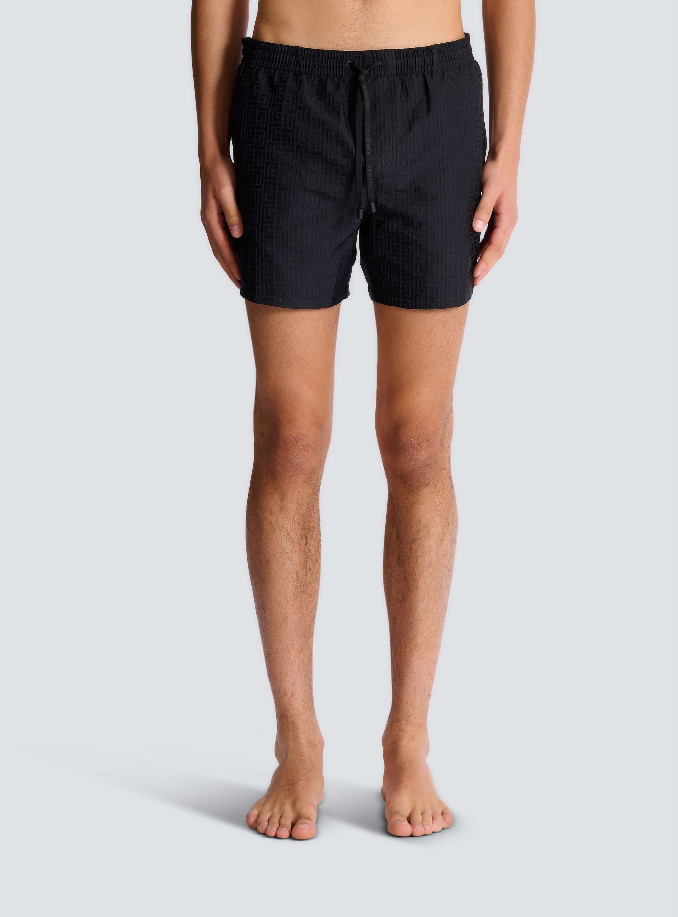 Monogrammed swim shorts