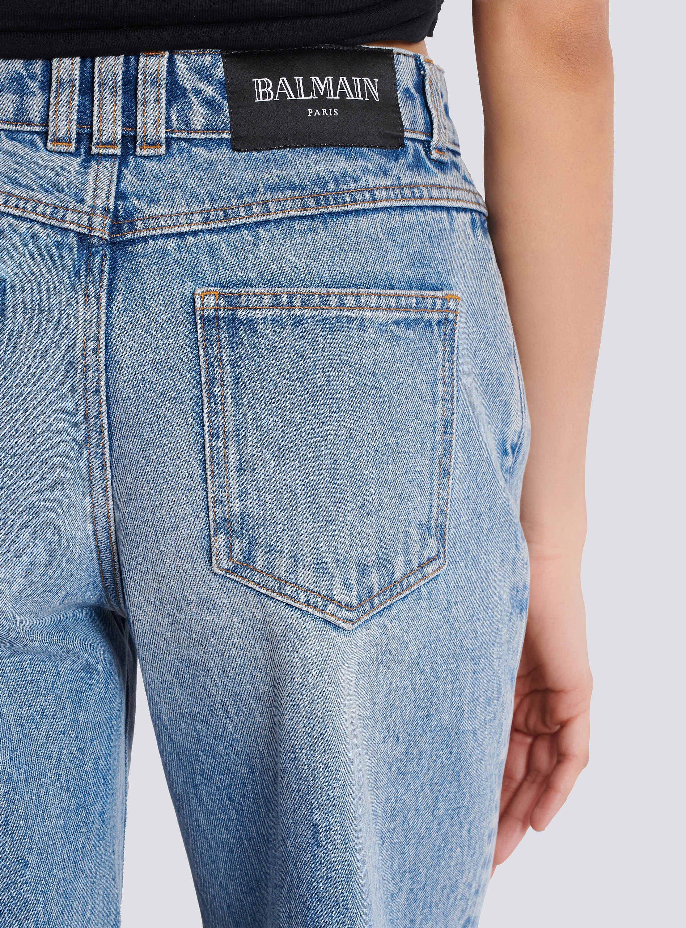 Straight-leg faded denim jeans