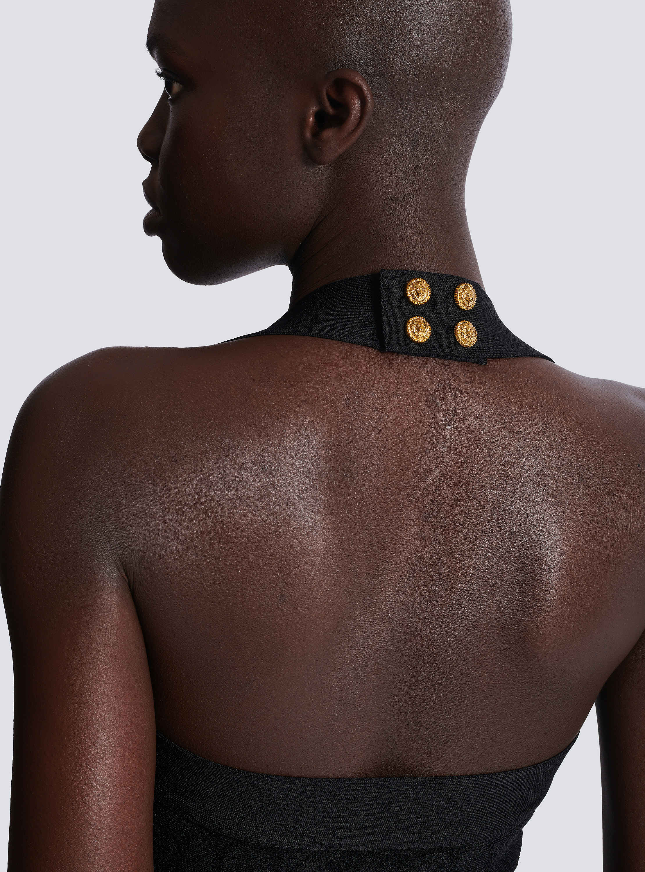 Flared halterneck dress in crocodile knit