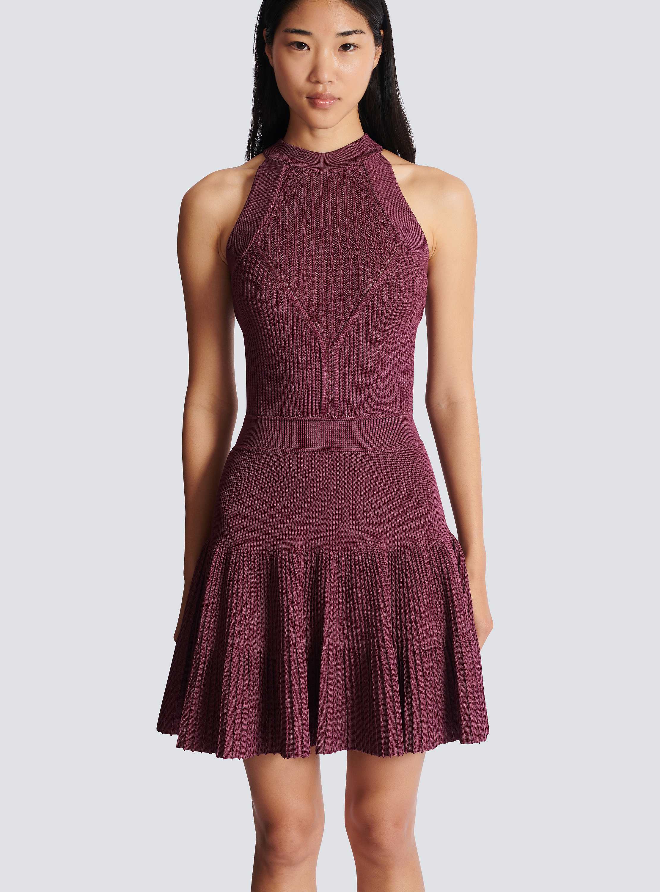 Sleeveless flared dress in openwork knit