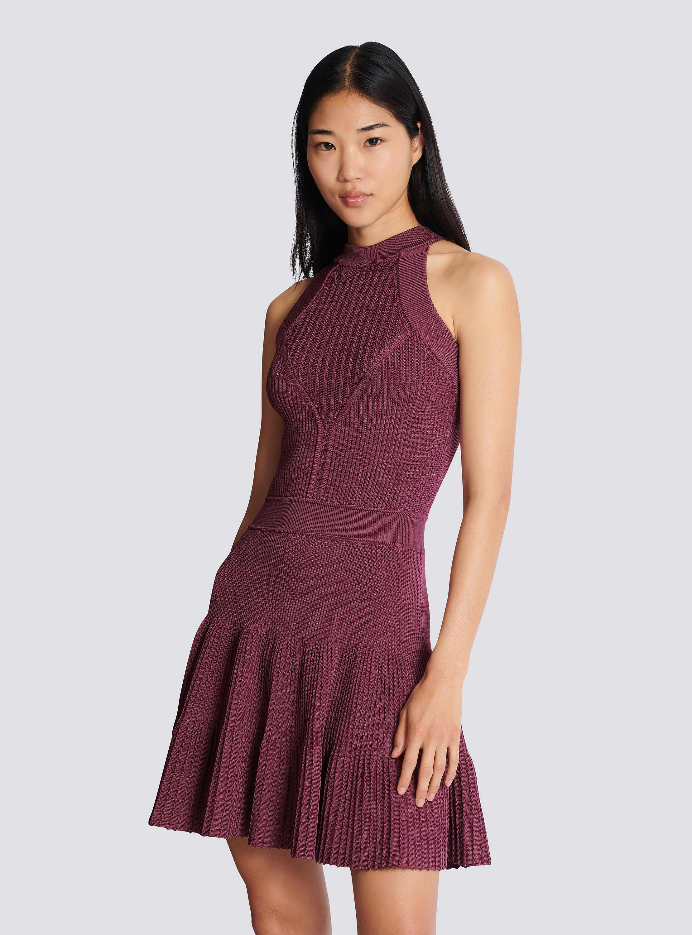 Sleeveless flared dress in openwork knit