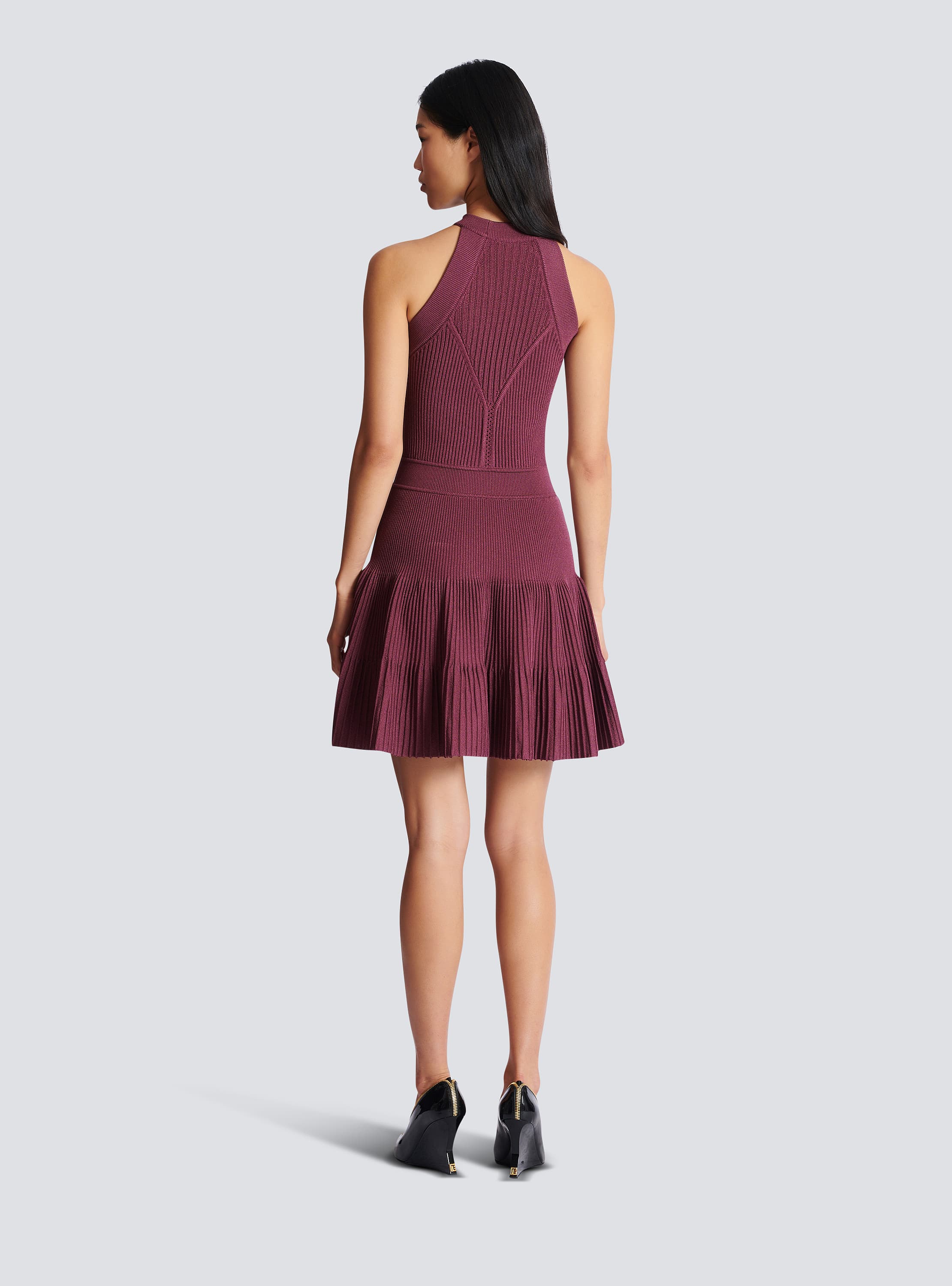 Sleeveless flared dress in openwork knit
