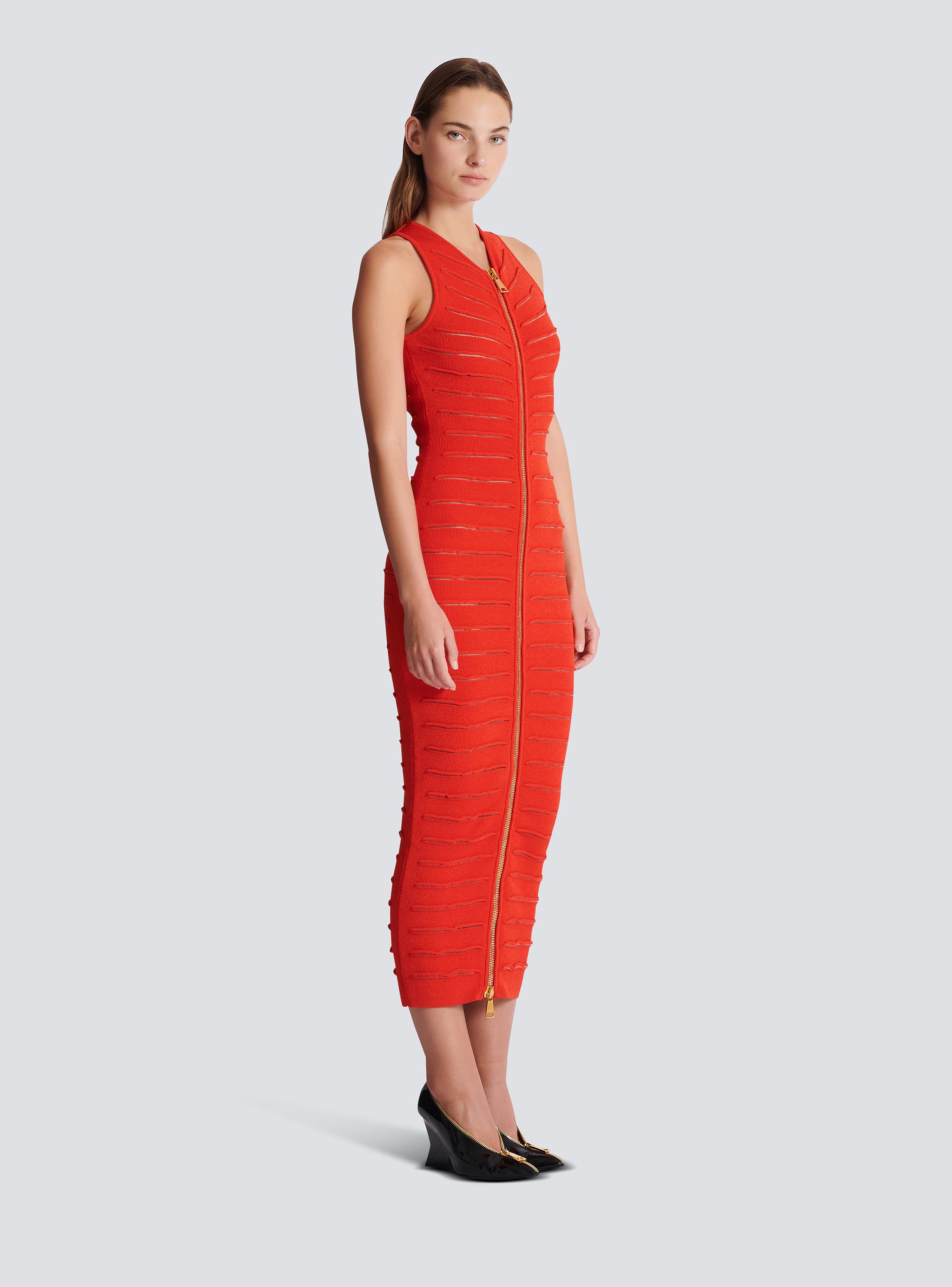 Long sleeveless dress in crocodile knit