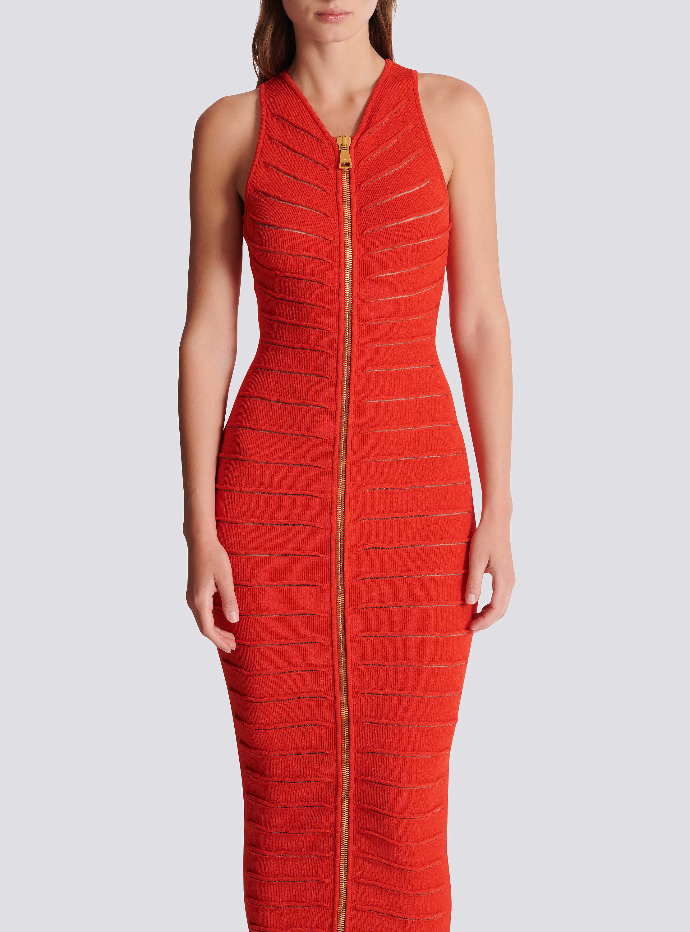 Long sleeveless dress in crocodile knit