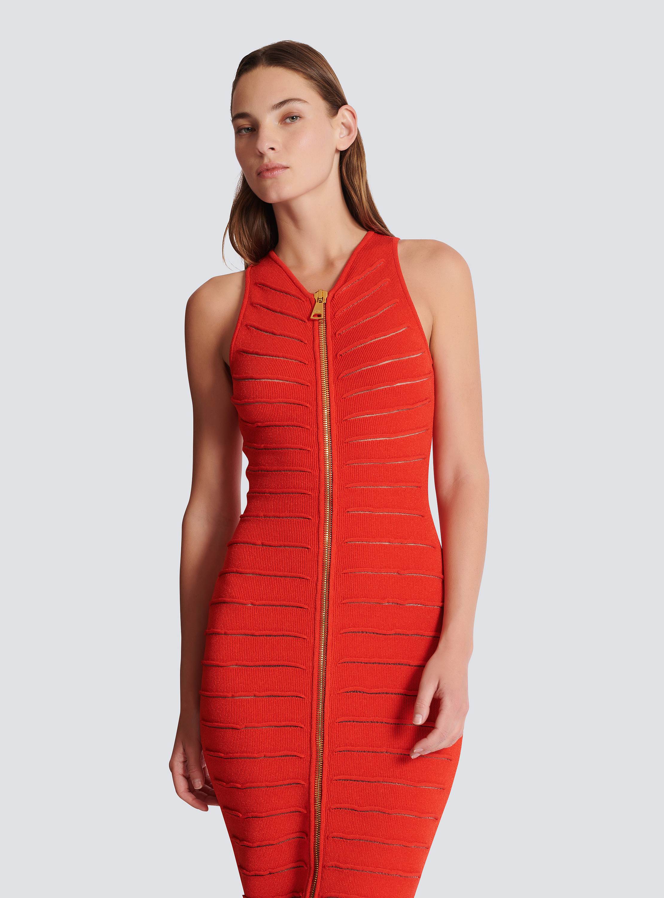 Long sleeveless dress in crocodile knit