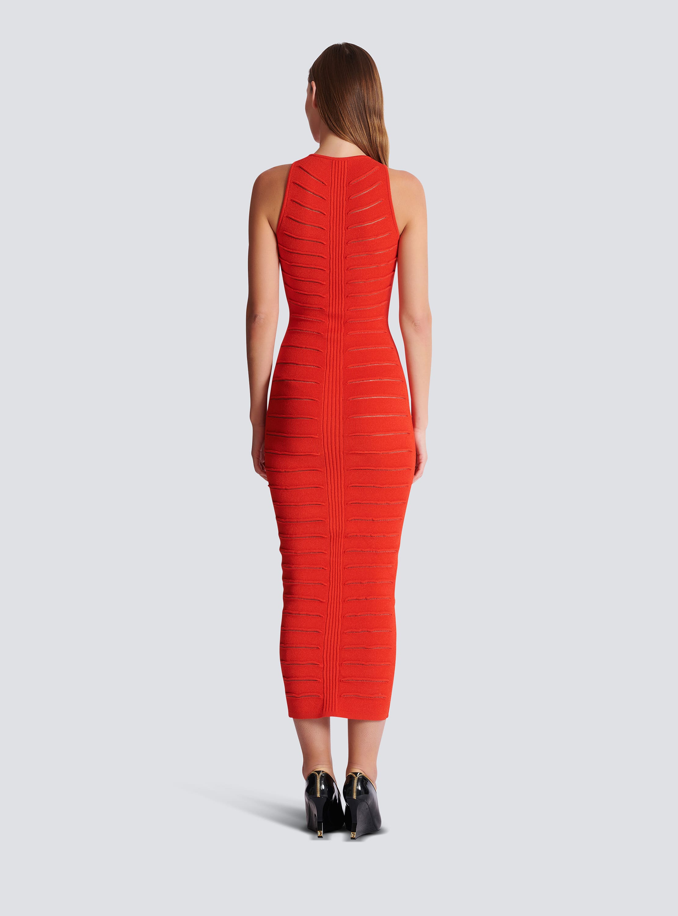 Long sleeveless dress in crocodile knit