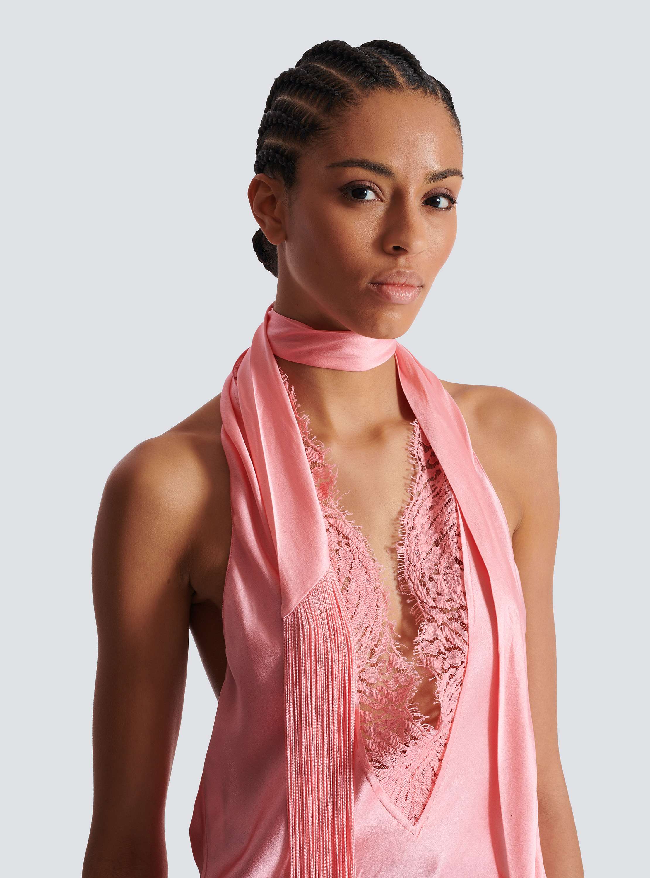 Backless fringed satin top