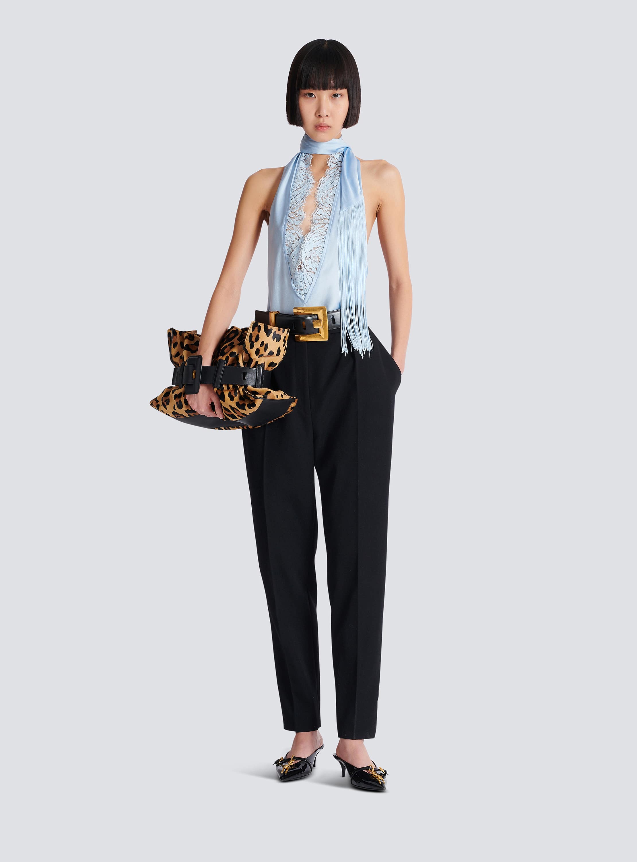 Backless fringed satin top