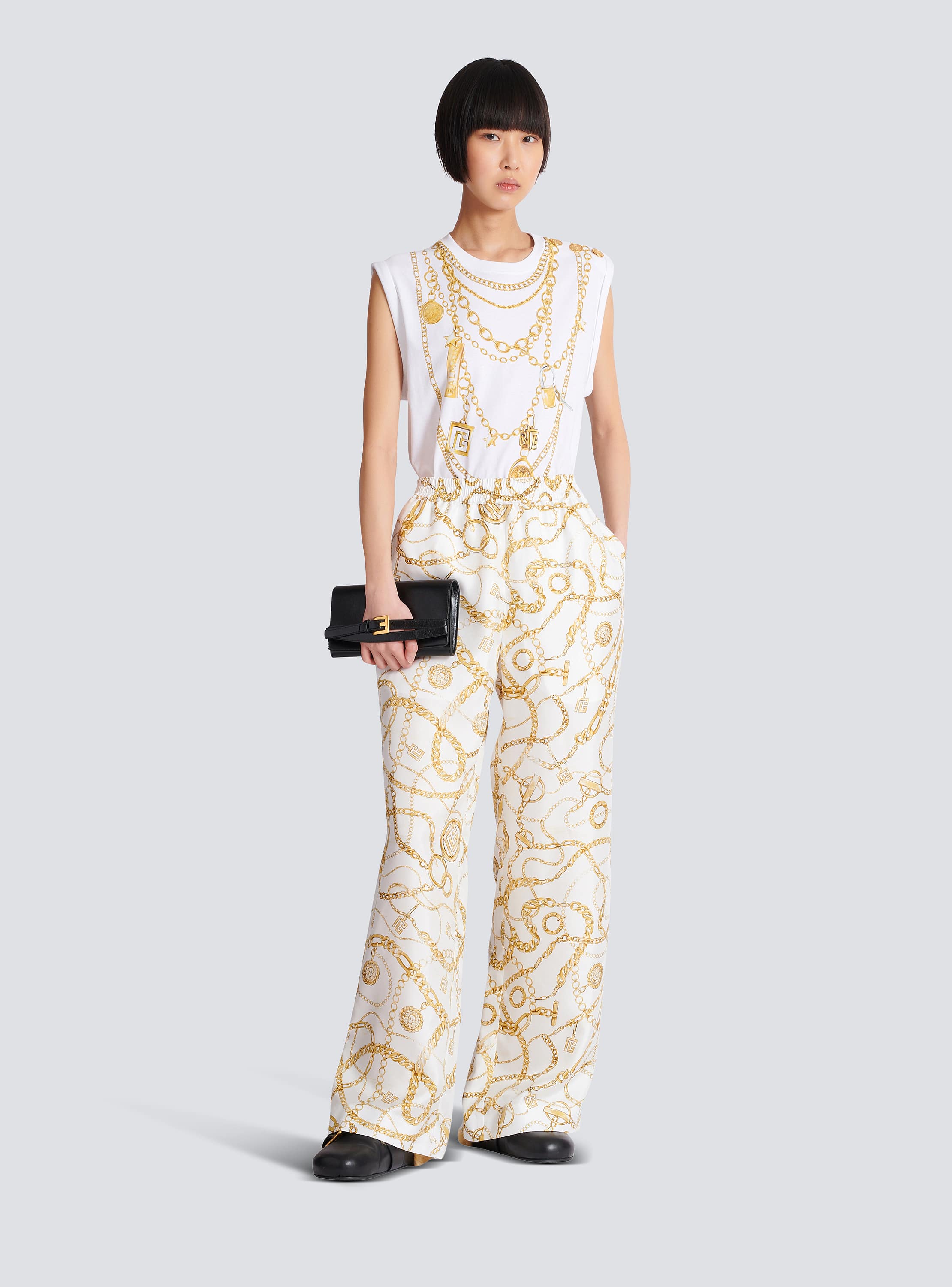 Flowing printed silk trousers with Balmain Chains pattern