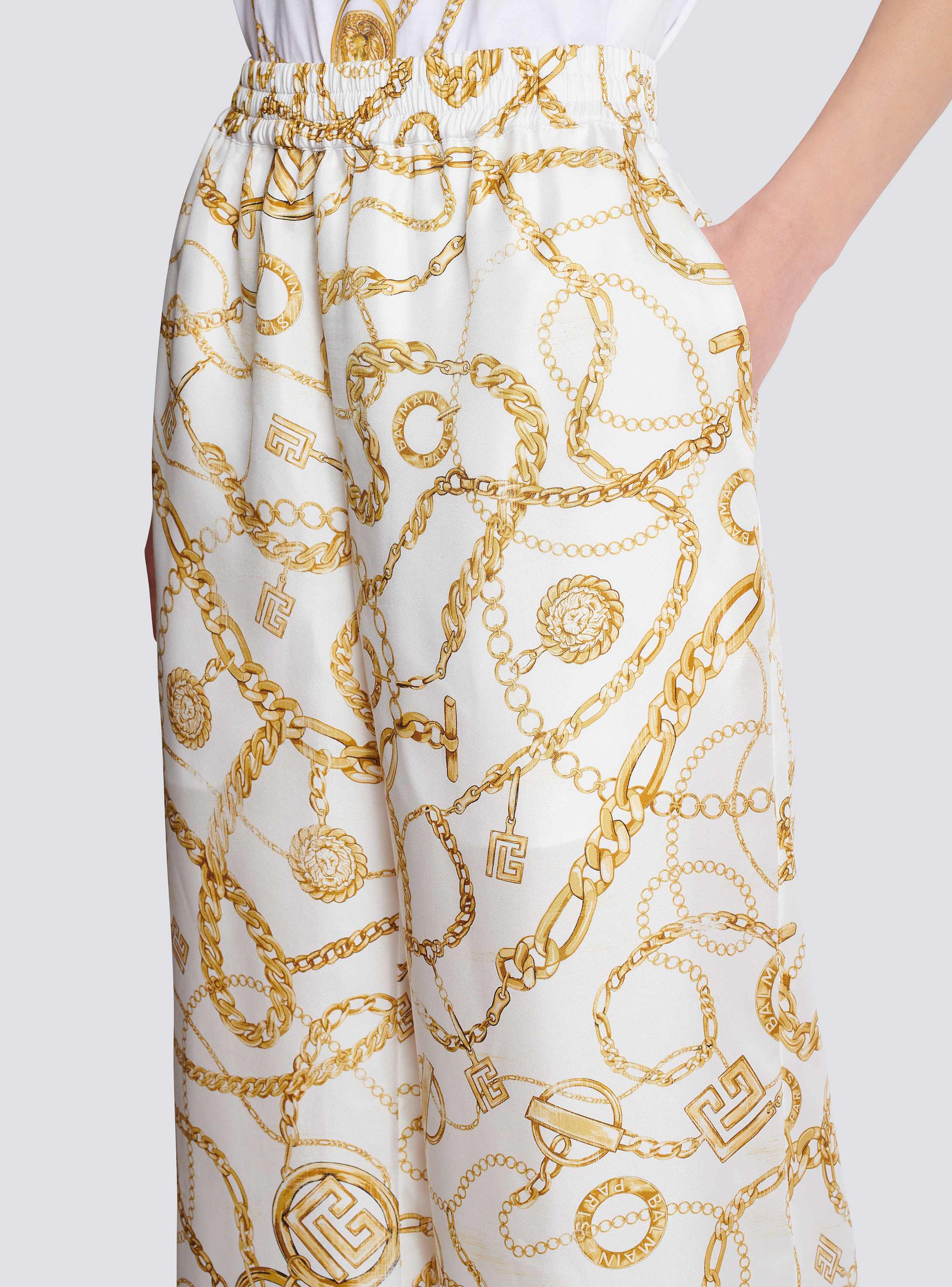 Flowing printed silk trousers with Balmain Chains pattern