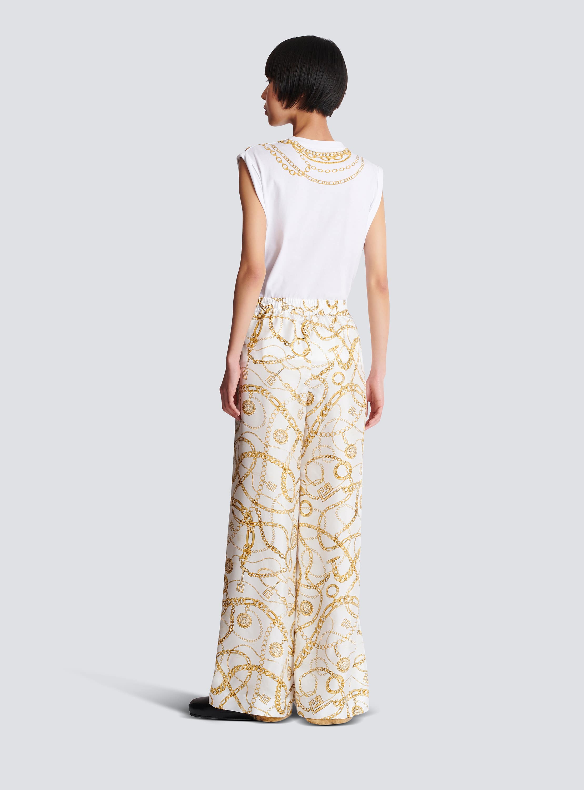 Flowing printed silk trousers with Balmain Chains pattern