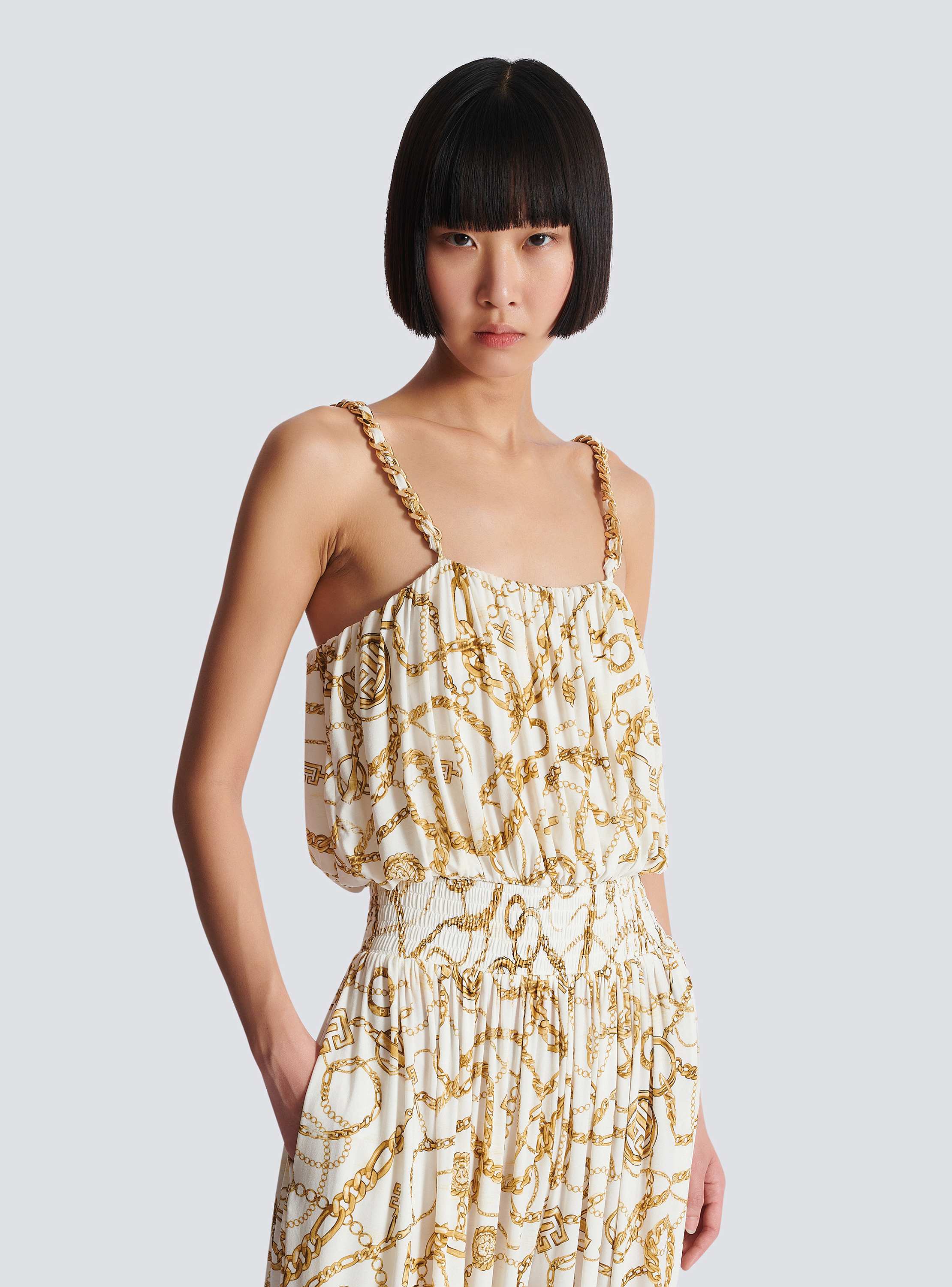 Flowing printed jumpsuit with Balmain Chains pattern