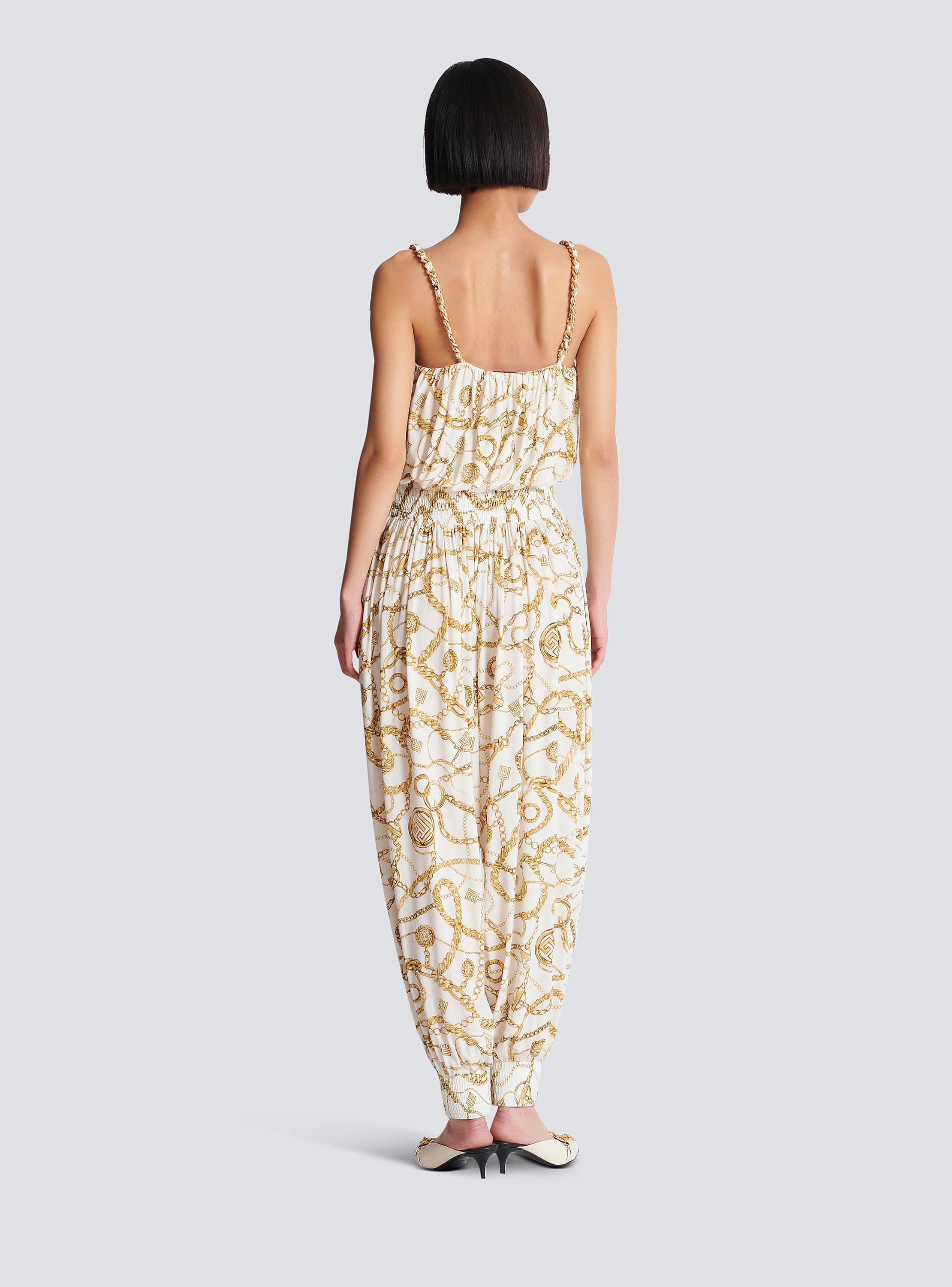 Flowing printed jumpsuit with Balmain Chains pattern