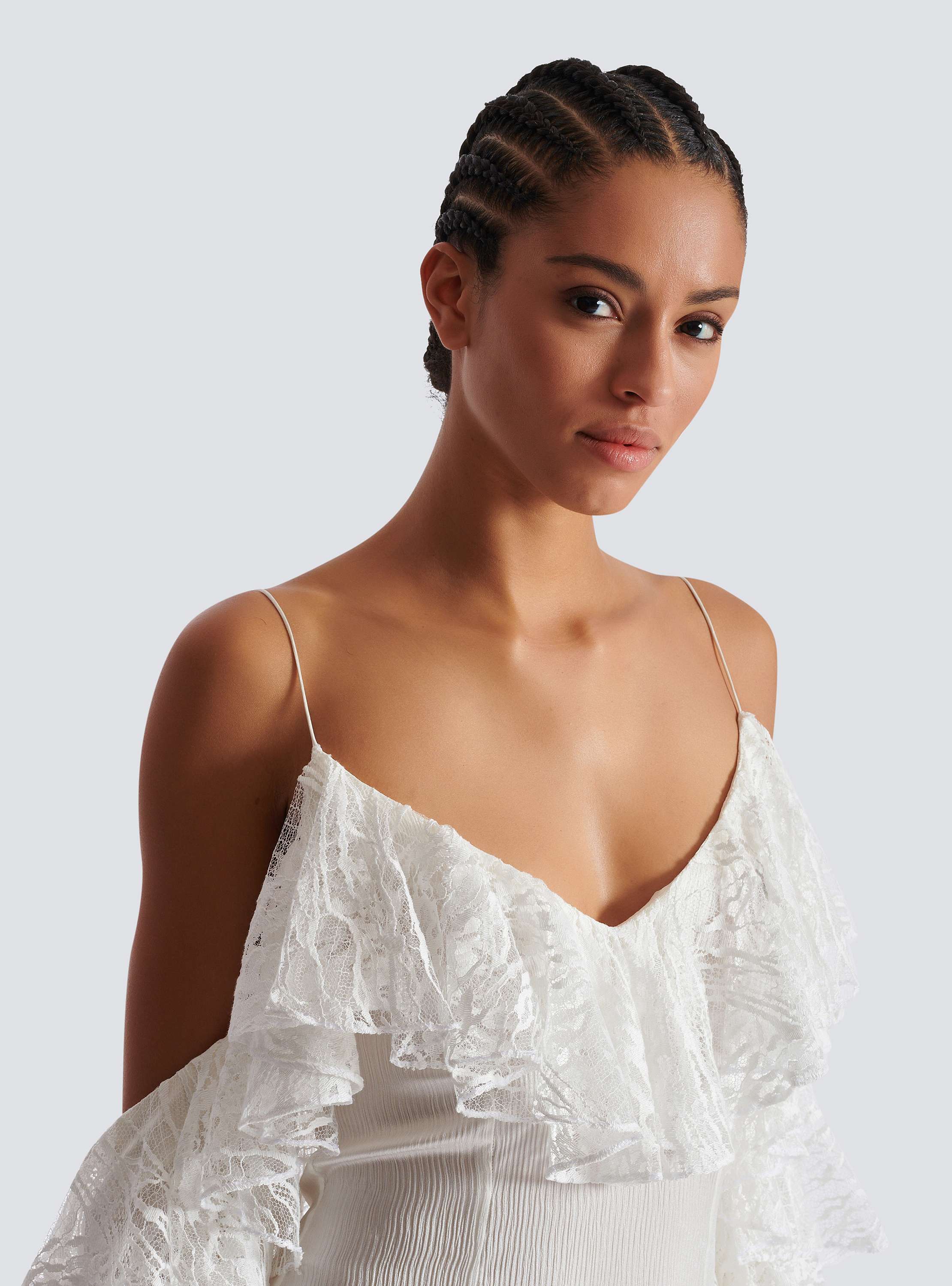 Flowing dress with lace ruffles