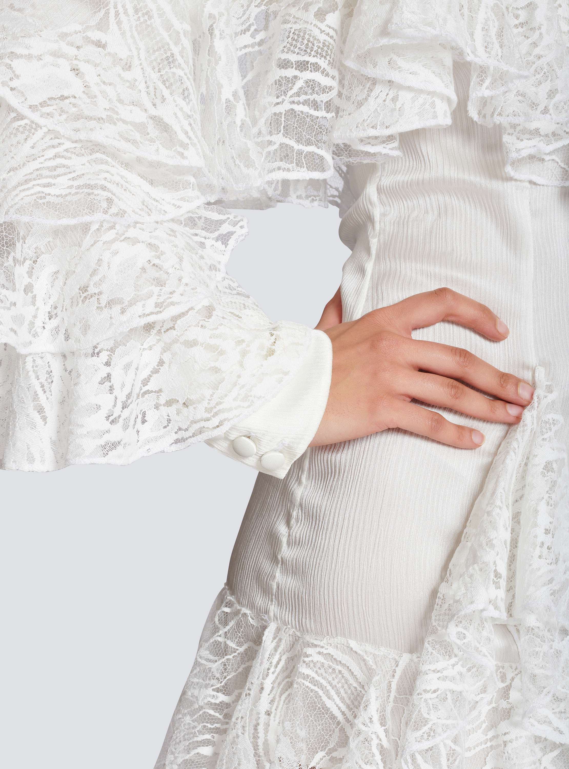 Flowing dress with lace ruffles